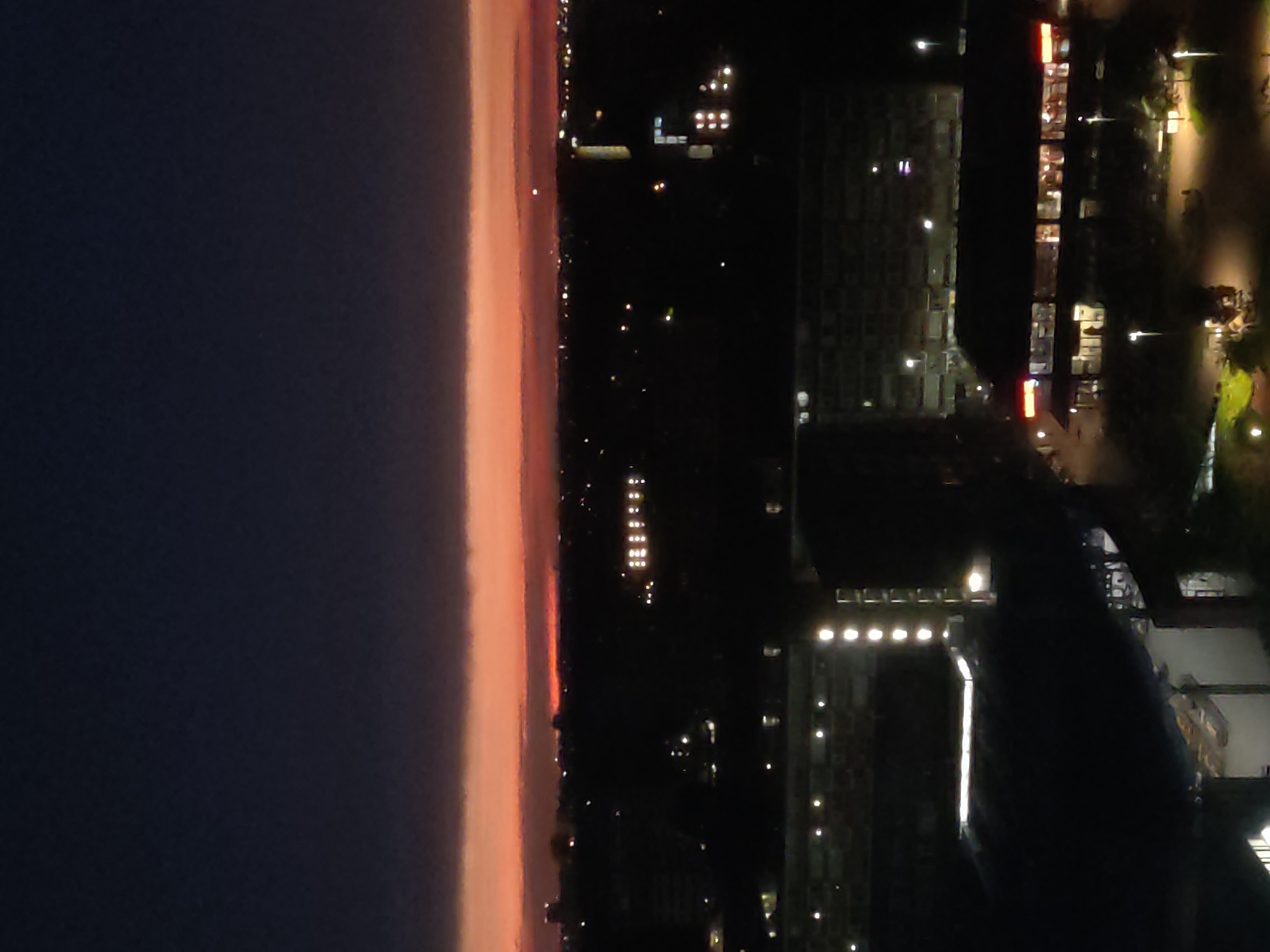 Late-night aerial views over Rijswijk with a glowing horizon