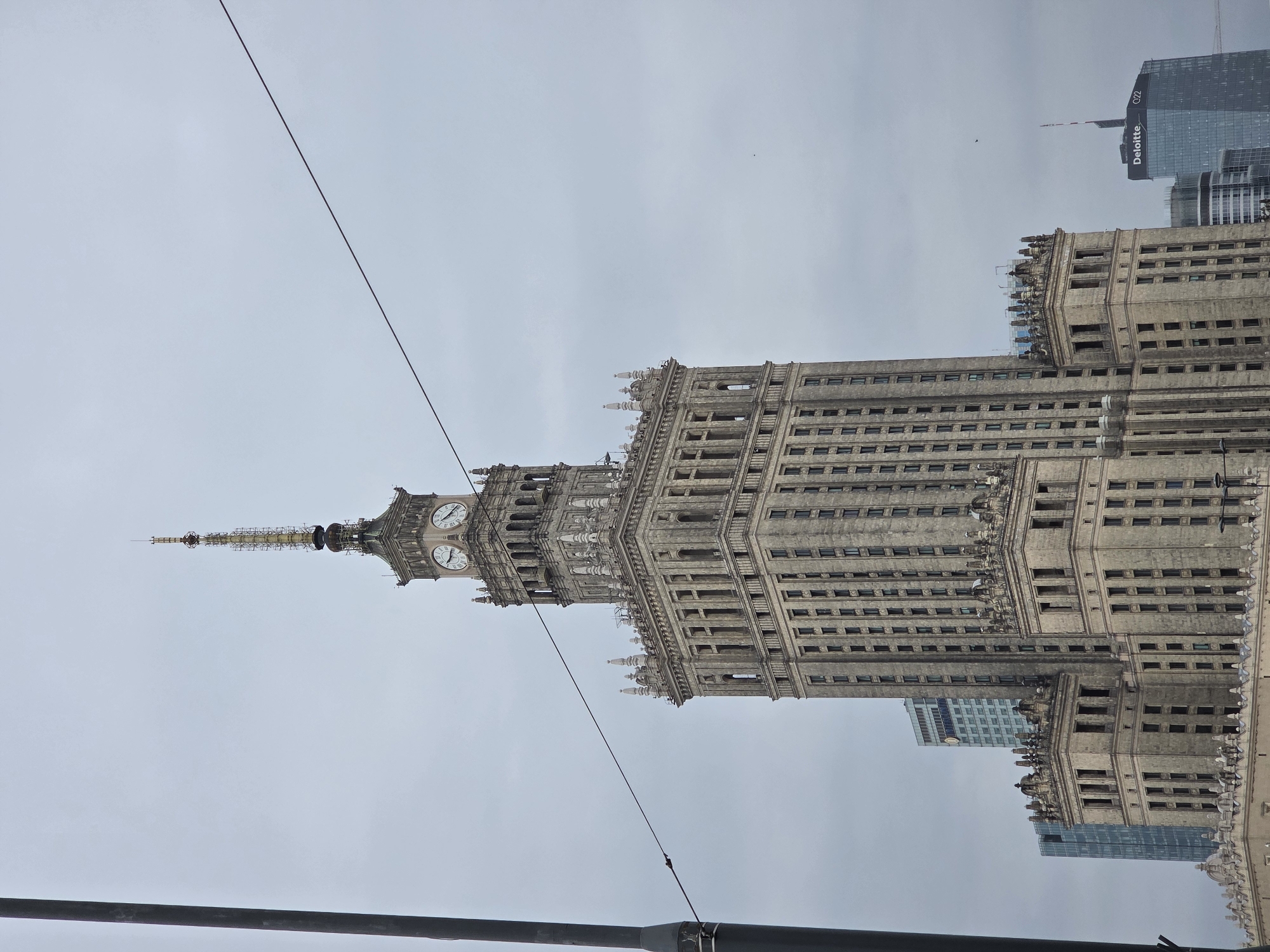 Warsaw Palace of Culture observed under overcast morning skies