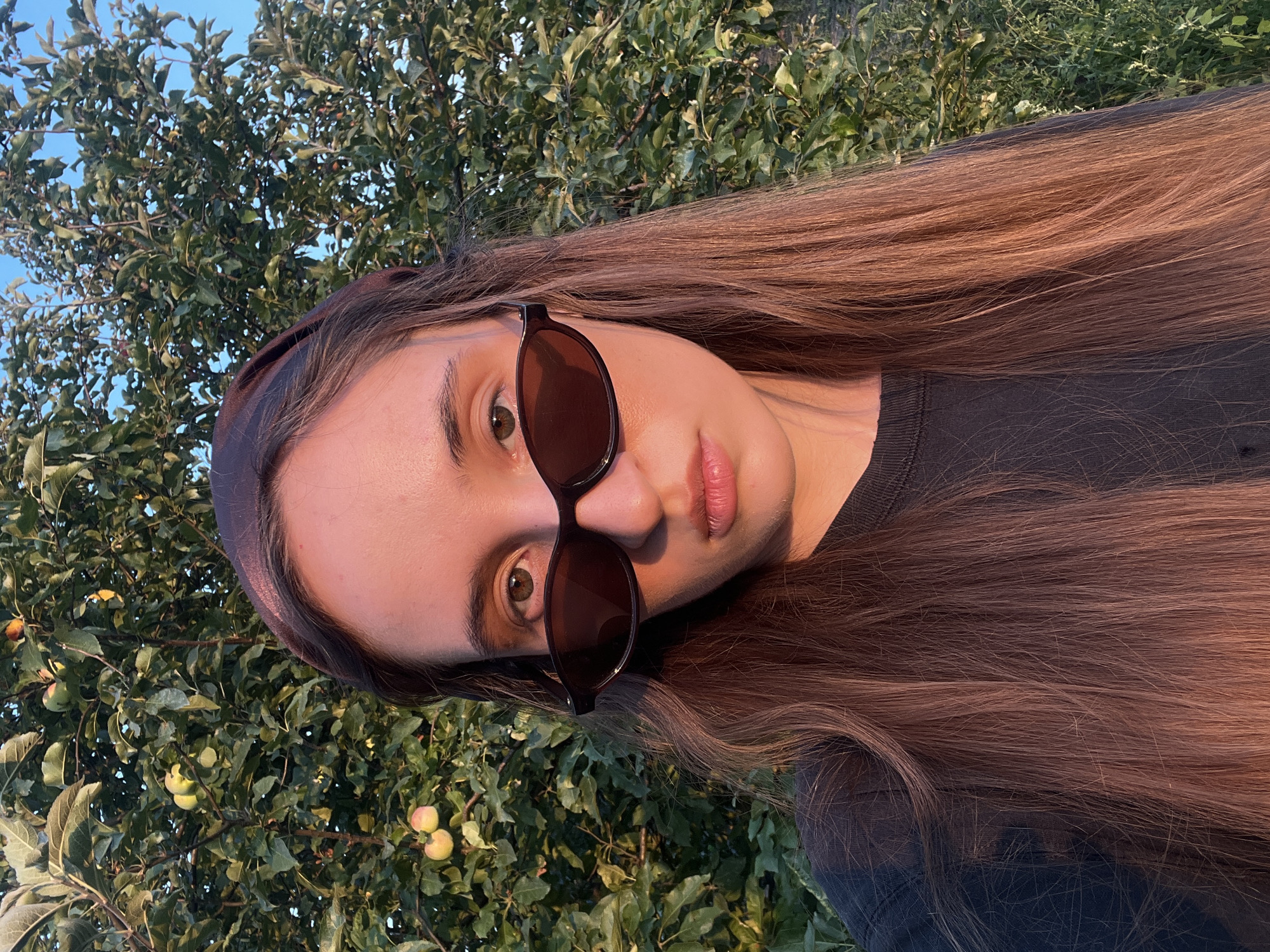 Golden hour outdoor portraits with sunglasses and a bandana