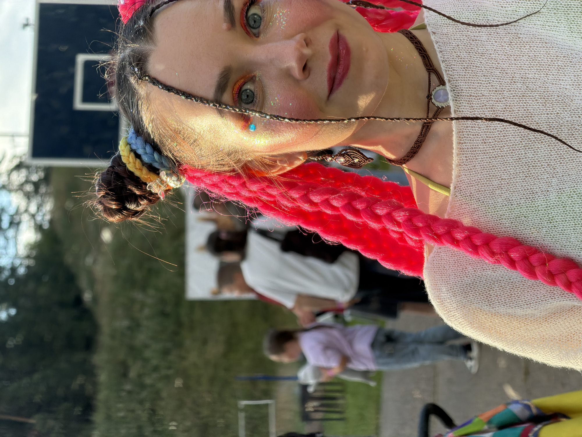 Summer festival in Nechkino with sculptures, rides, and festive looks