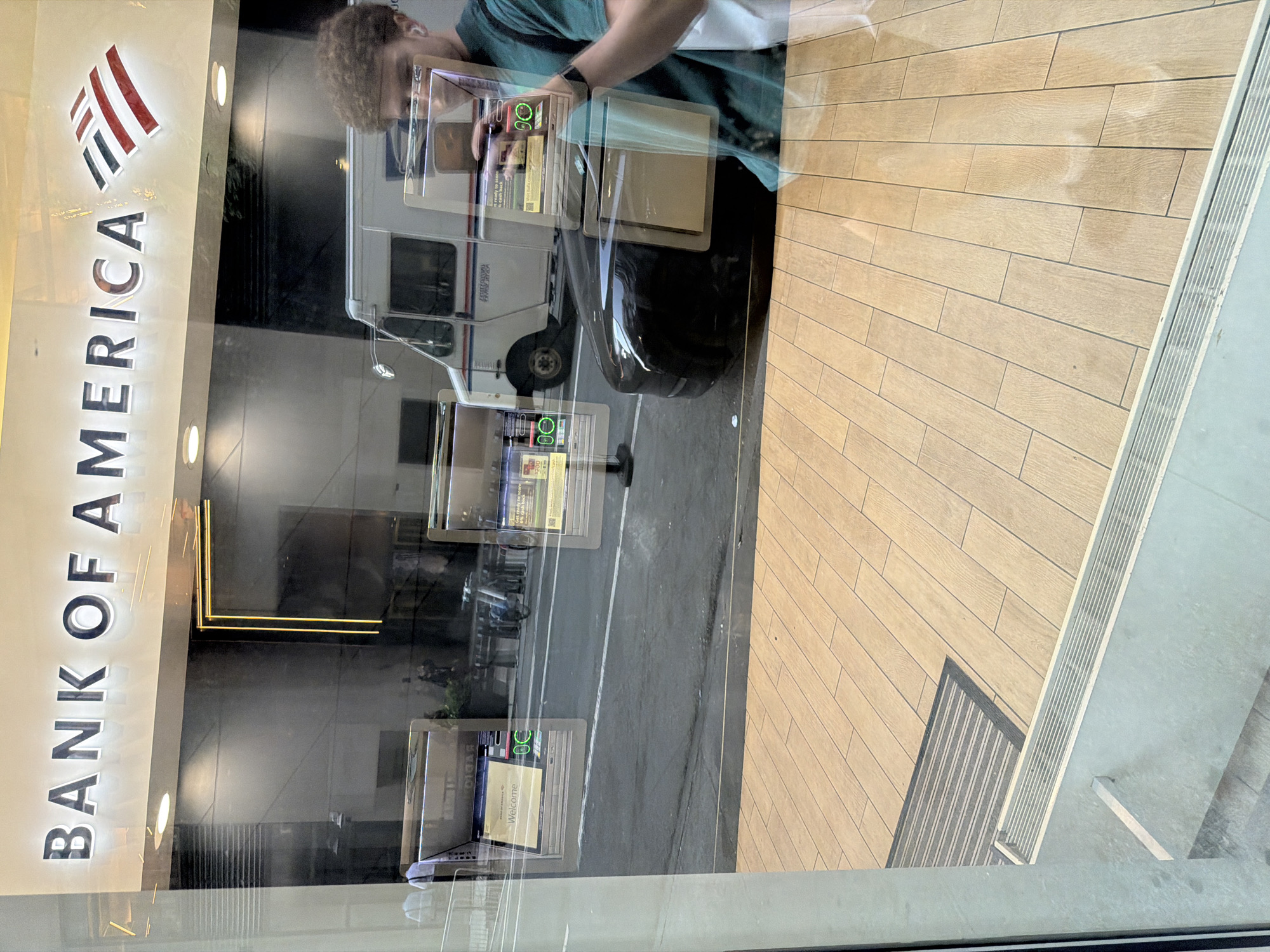 Person photographed outside NYC Bank of America branch
