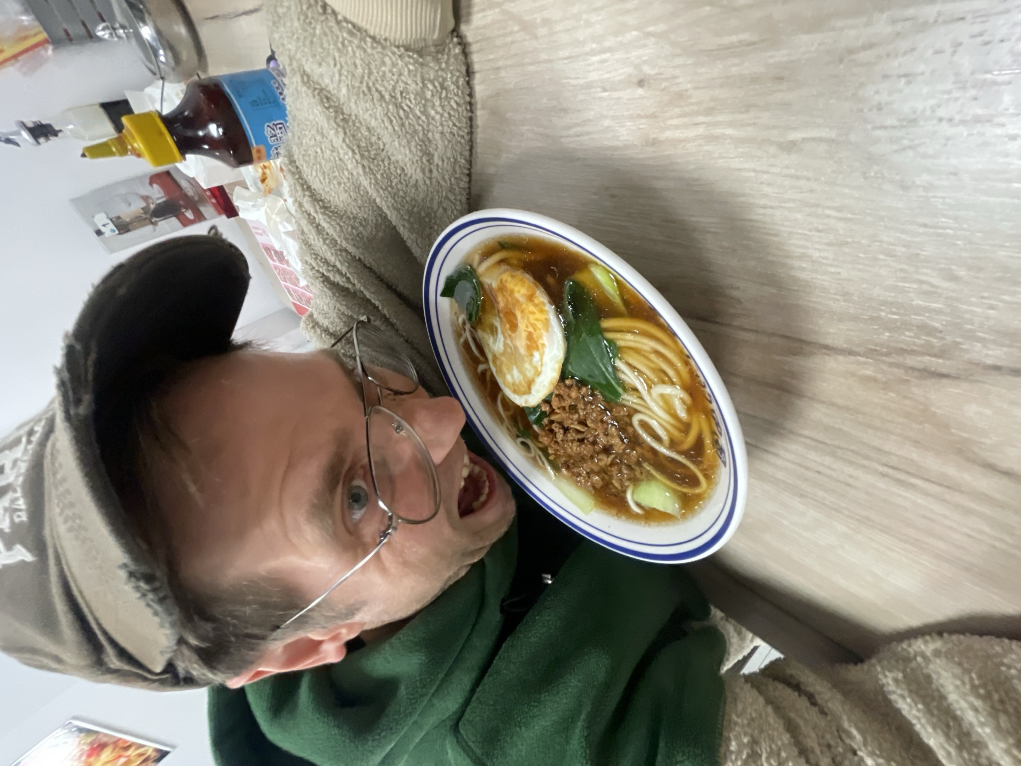 Person enjoys ramen lunch in Belgrade restaurant