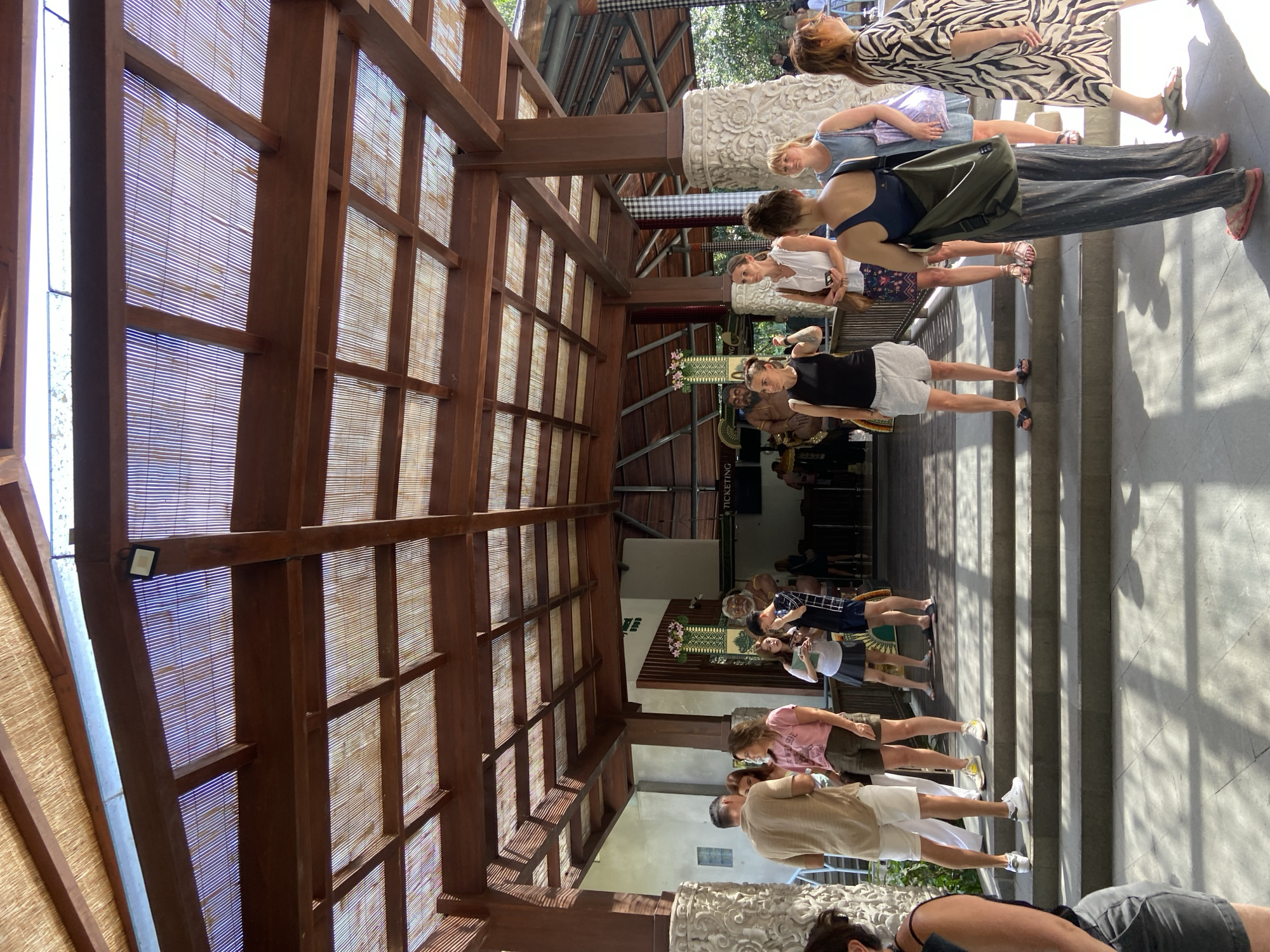 Morning crowd moves through Ubud's Monkey Forest with macaques front and center