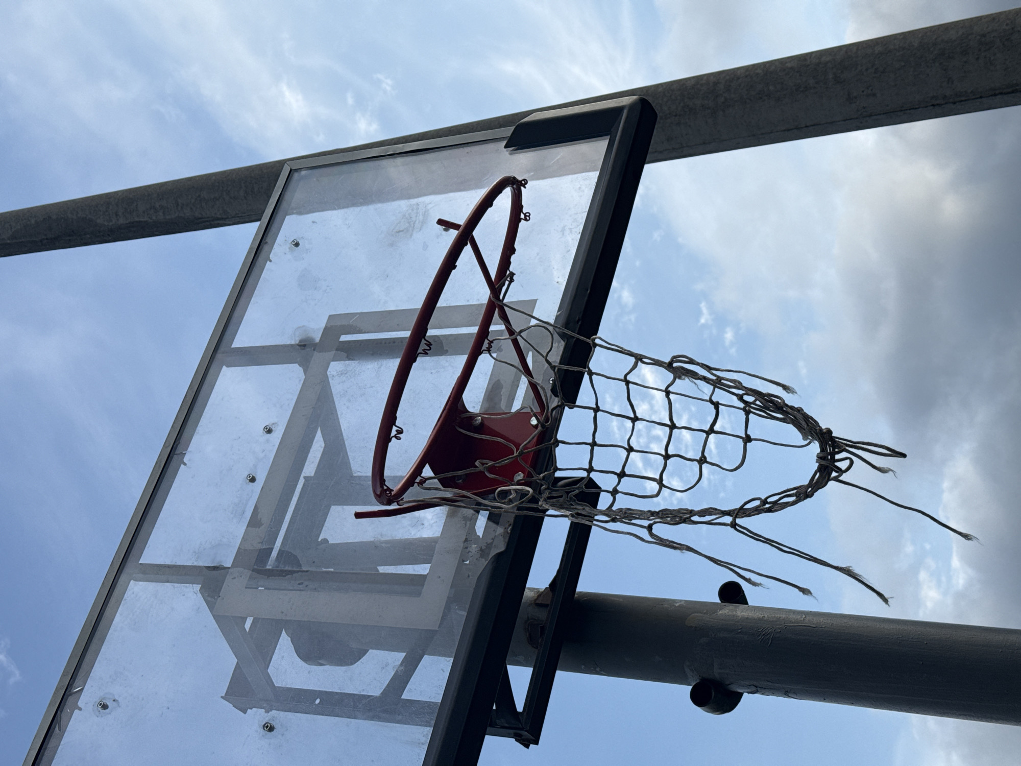 Playground hangout: hoops, rings, and climbing bars on a cloudy day