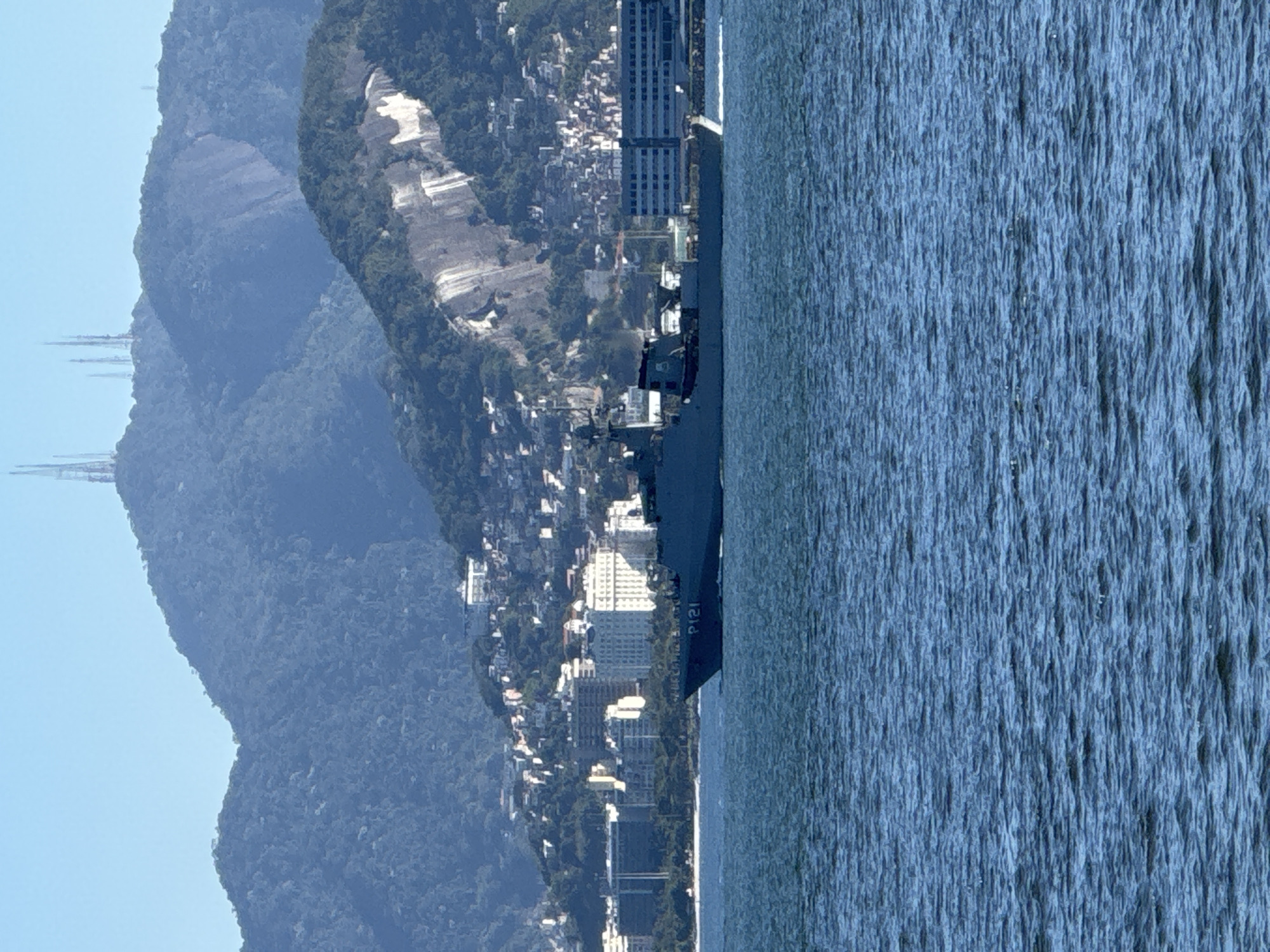 Navy ships and city skyline across Guanabara Bay