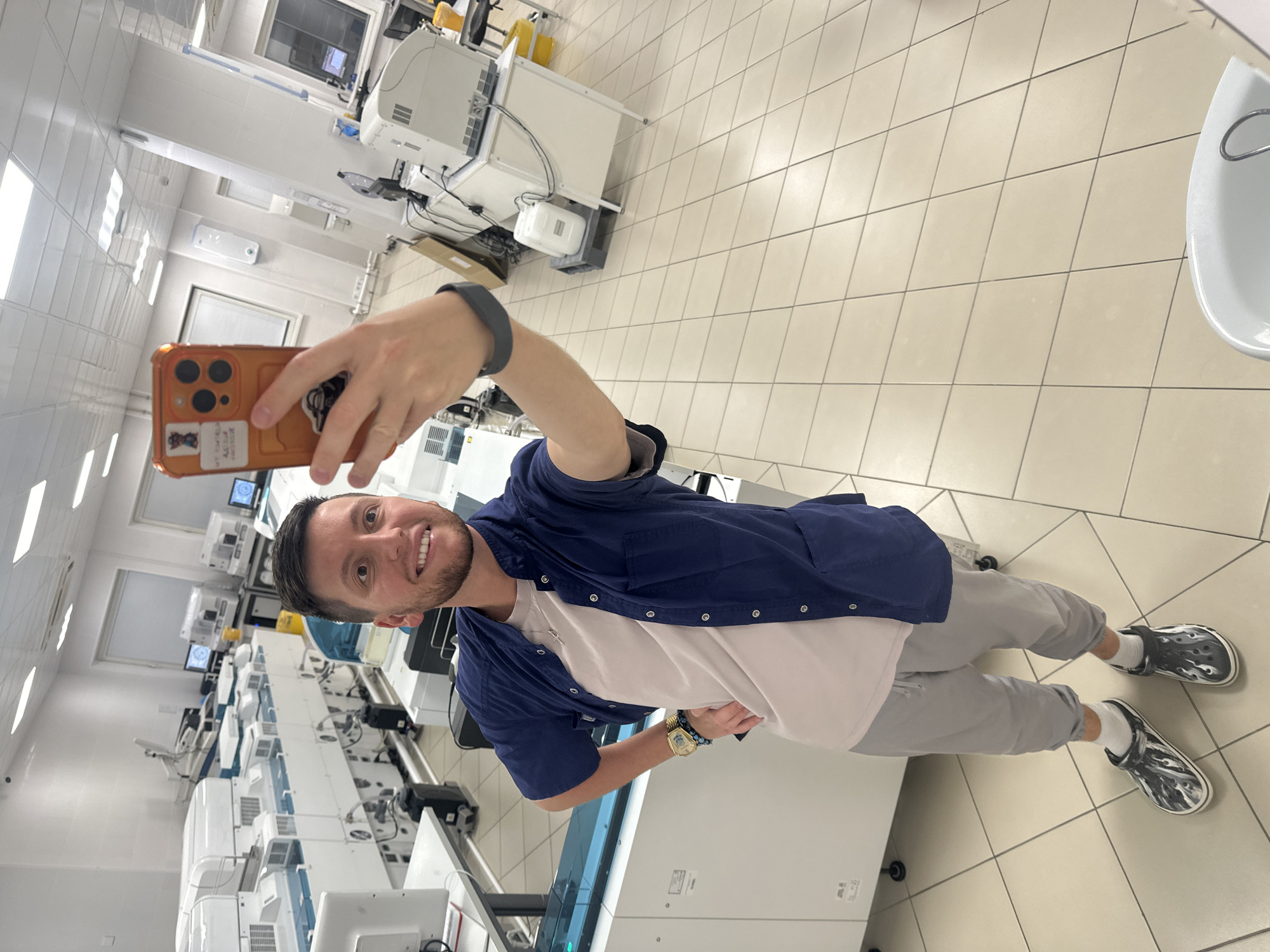 Young man documents laboratory work session in Moscow