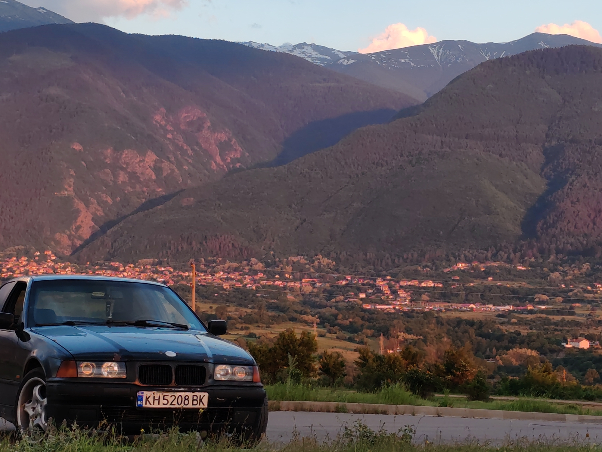 BMW parked at scenic overlook near Dupnitsa, Bulgaria