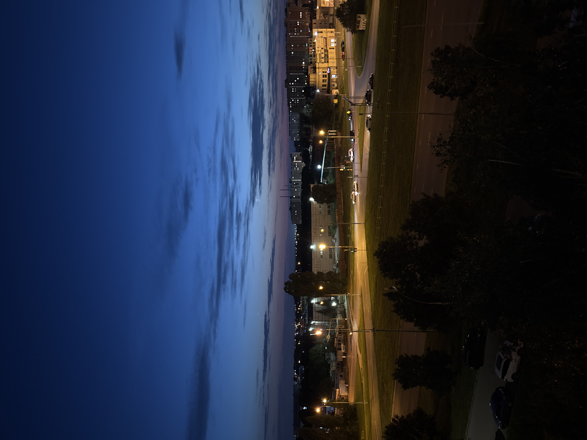 Dusk hangout in a Tolyatti apartment, city lights outside