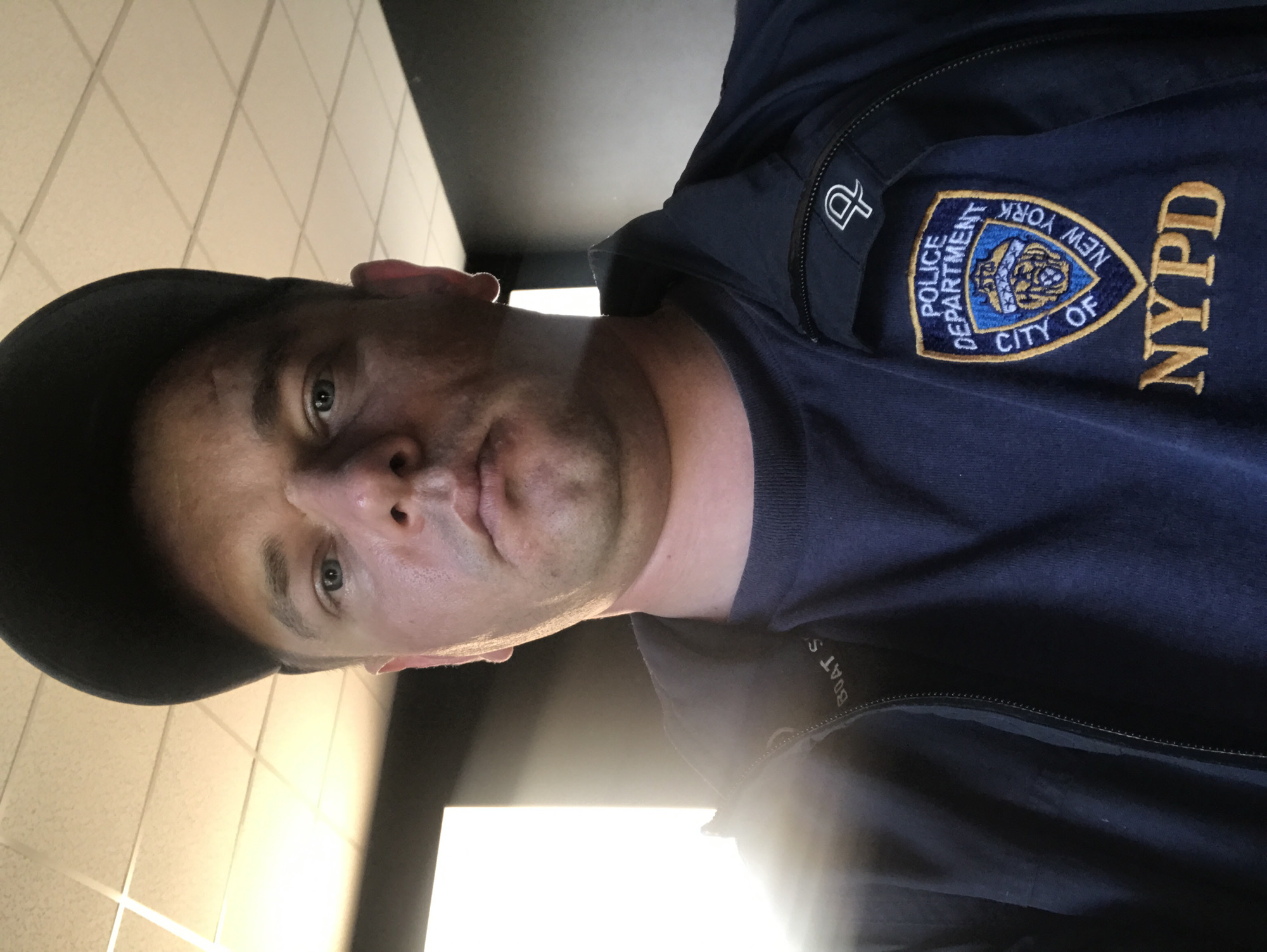 NYPD-shirted man photographed amid spring blooms in Kherson