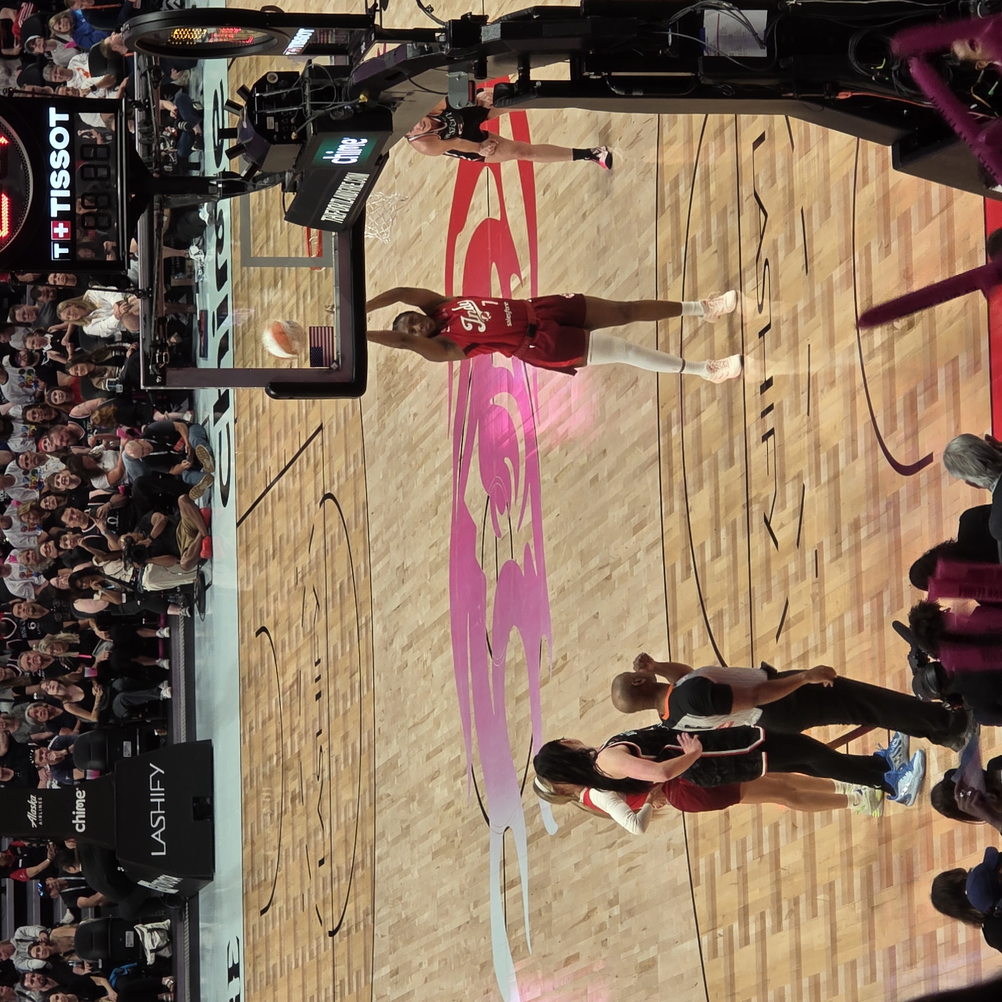 Live basketball action at a packed Portland arena