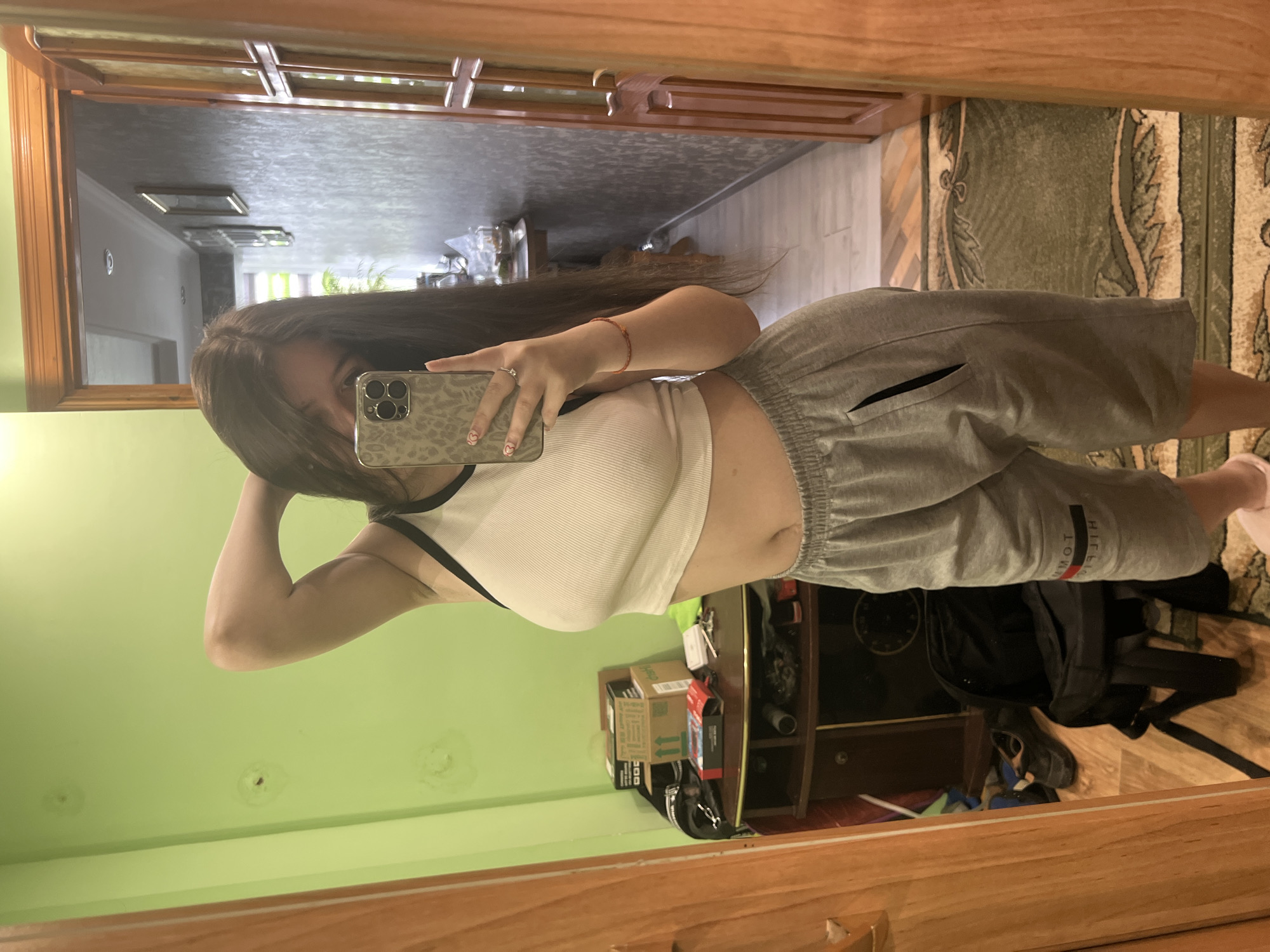 Woman takes selfies at home in Cherliany, Ukraine