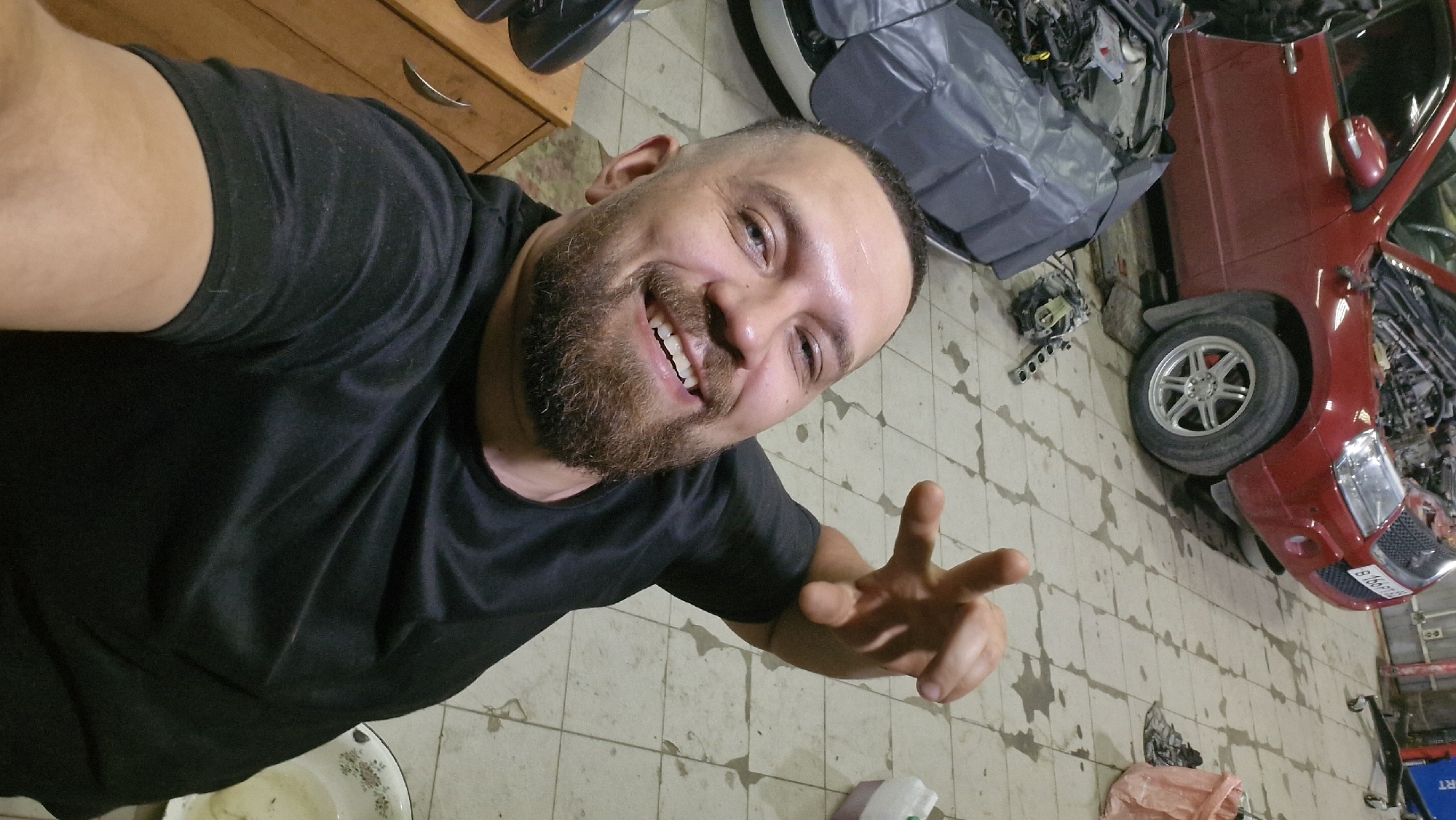 Hanging out in a Salekhard garage with a red SUV