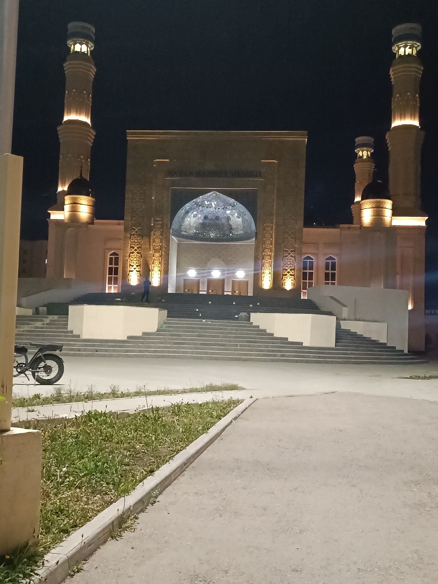 Evening scenes documented across Kokshetau featuring illuminated mosque