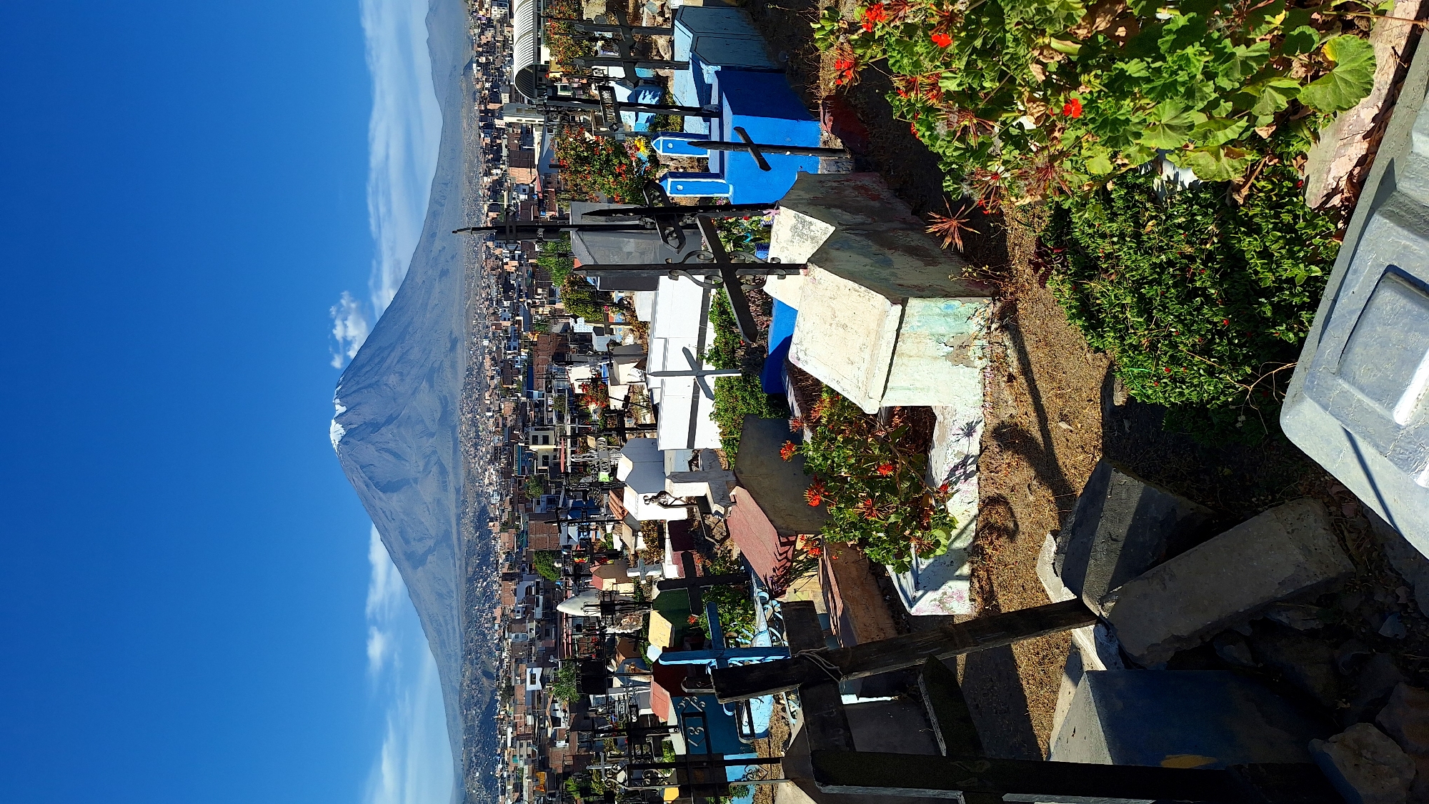 Cemetery visit and neighborhood scenes documented in Paucarpata, Peru