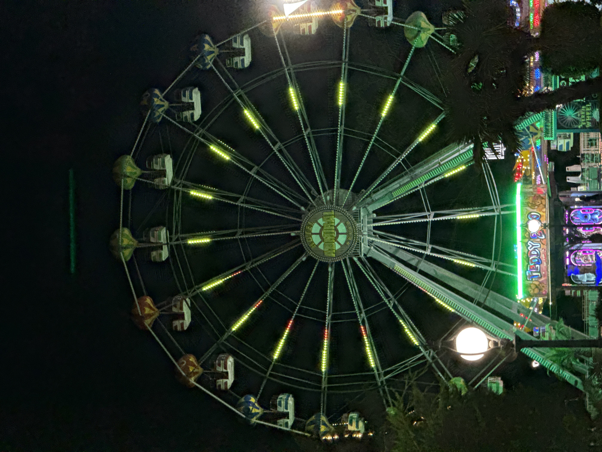Varna's Sea Garden fairground lights up a summer night