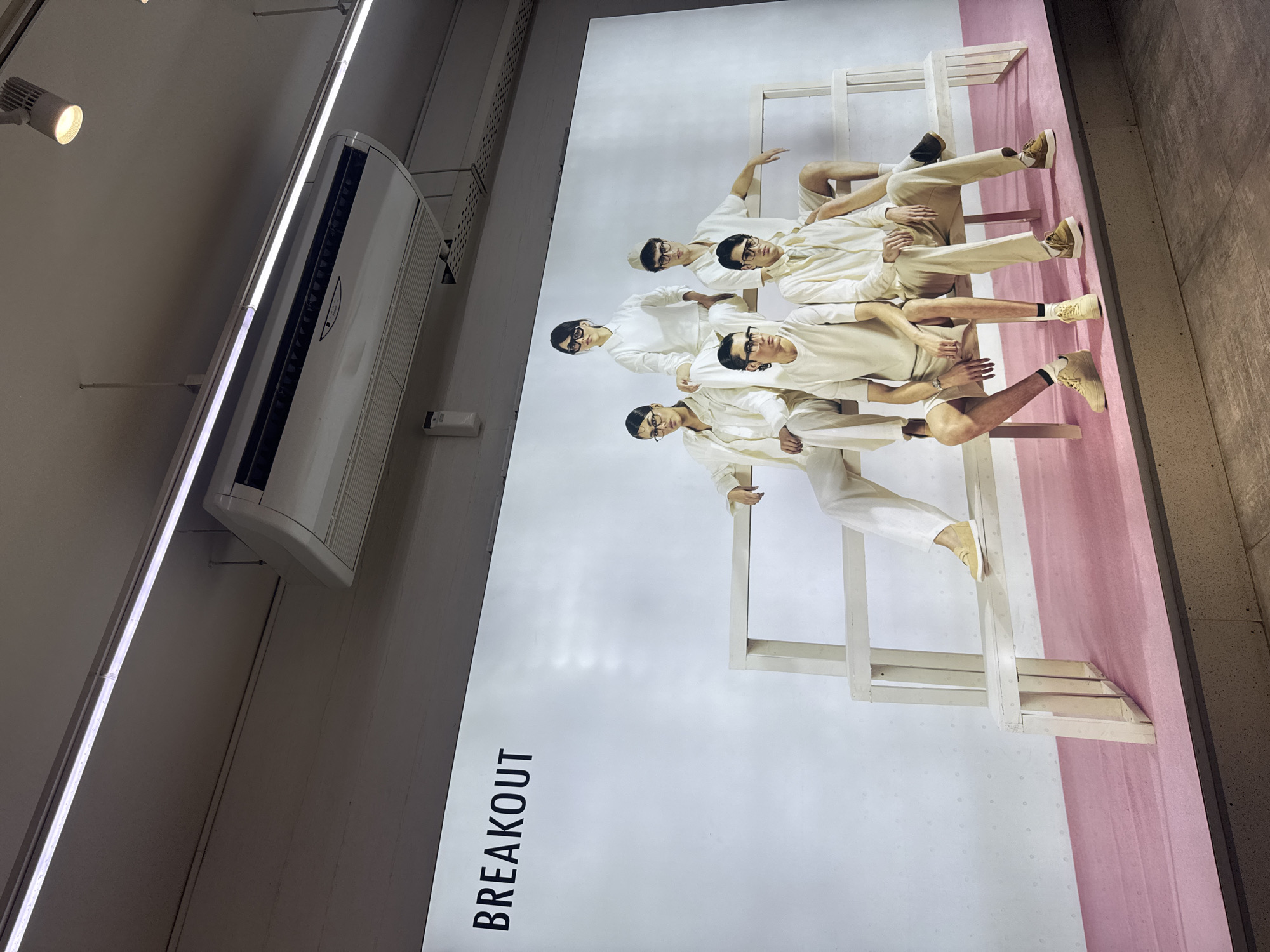 Customers Browse and Take Selfies at Lahore Clothing Store