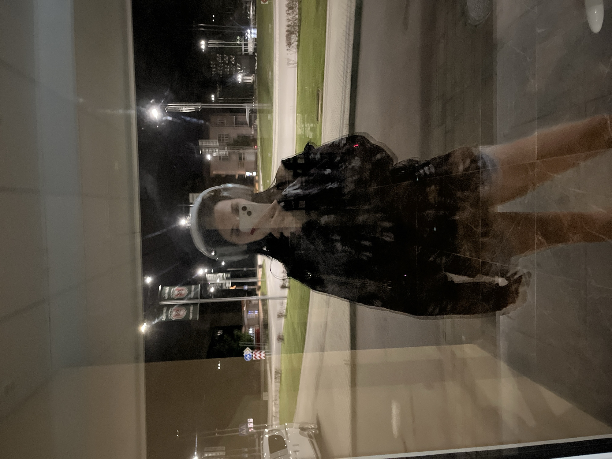 Night walk by a lit river, selfies and shadows along the way