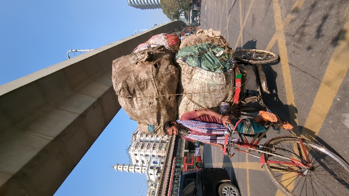 Morning street life documented across Dhaka during rush hours