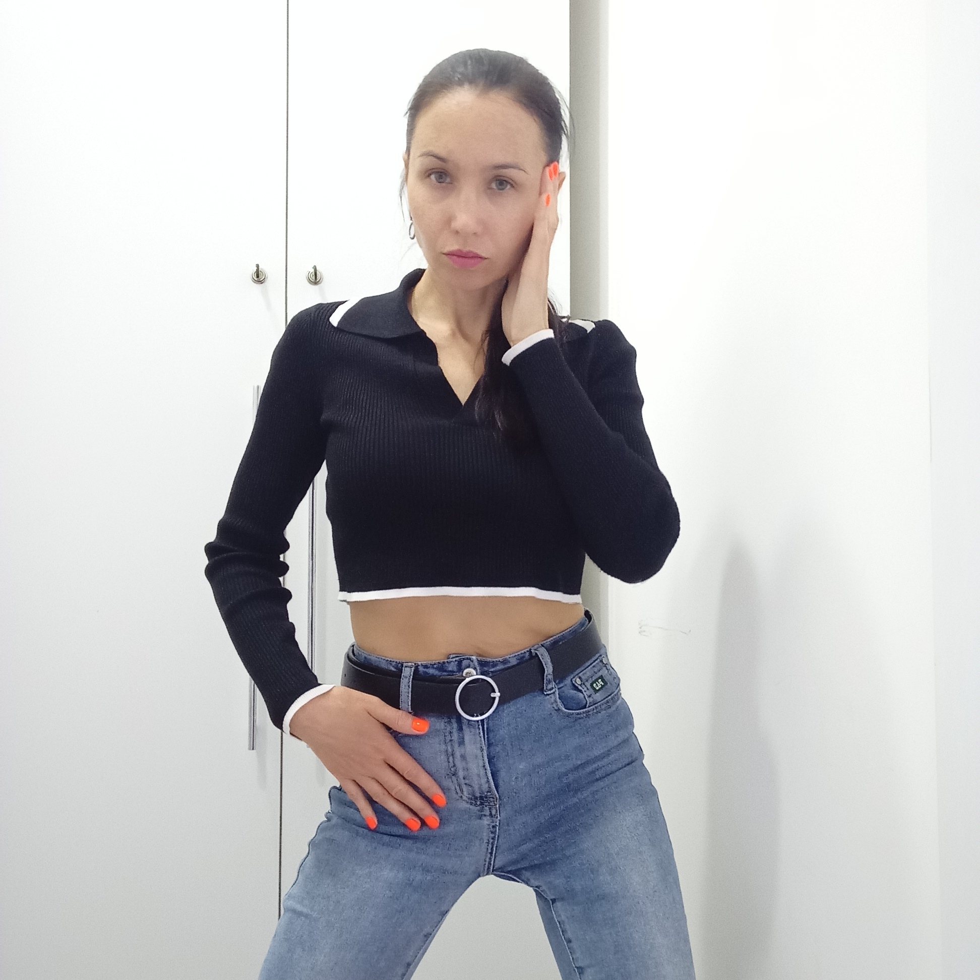 Woman poses for indoor photo session in Izhevsk apartment