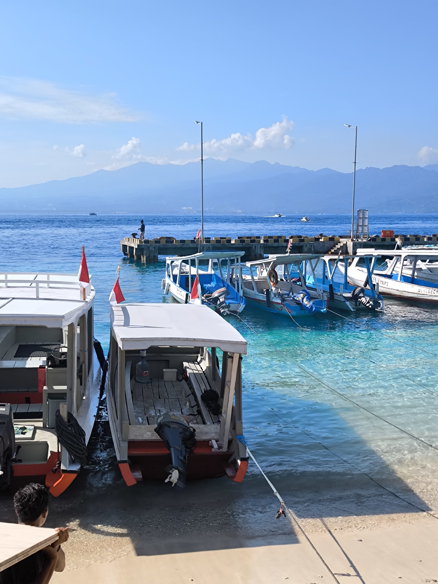 Daily life scenes documented across Indonesian coastal community