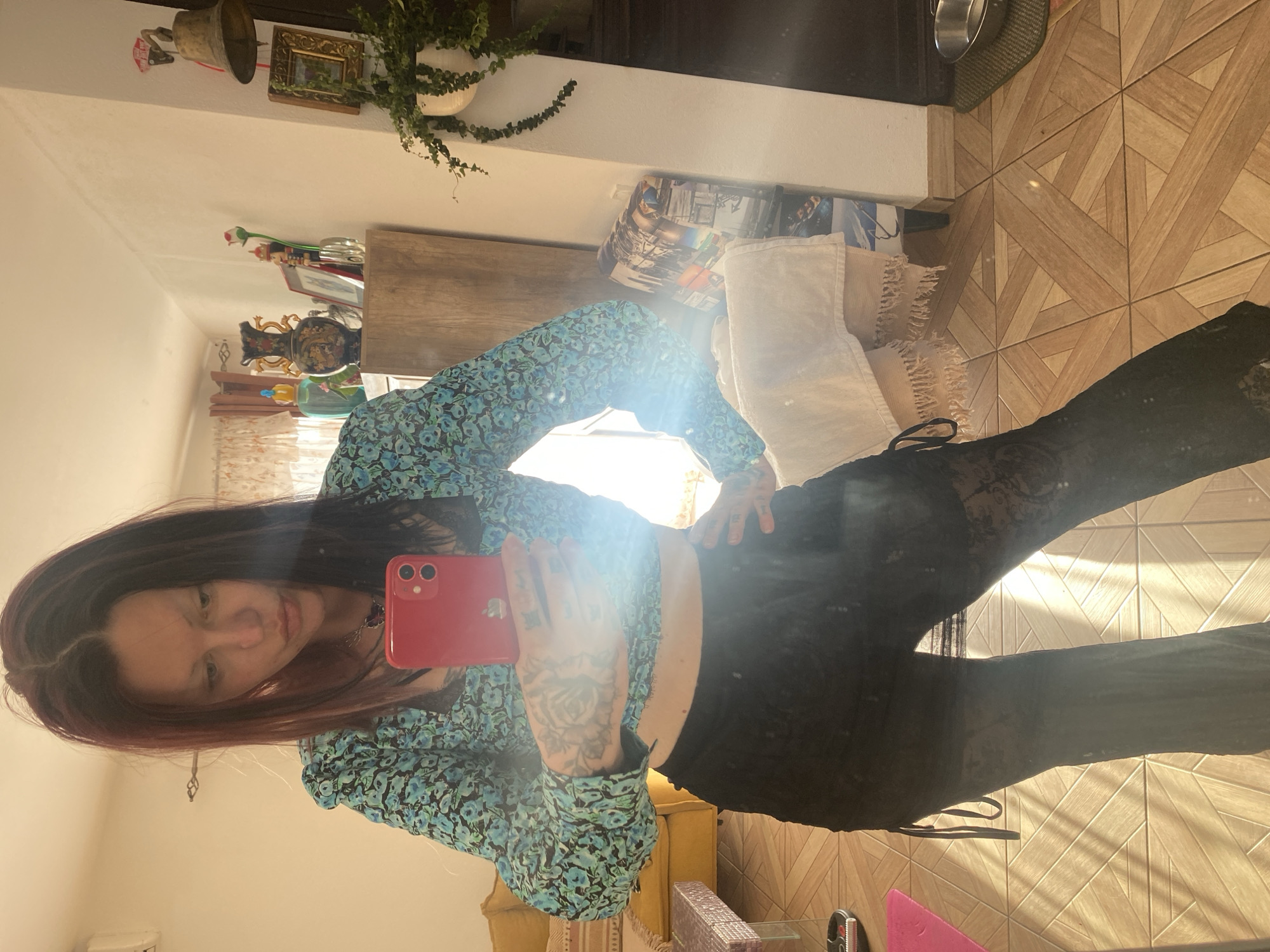Woman takes mirror selfies at home in Kunje, Montenegro
