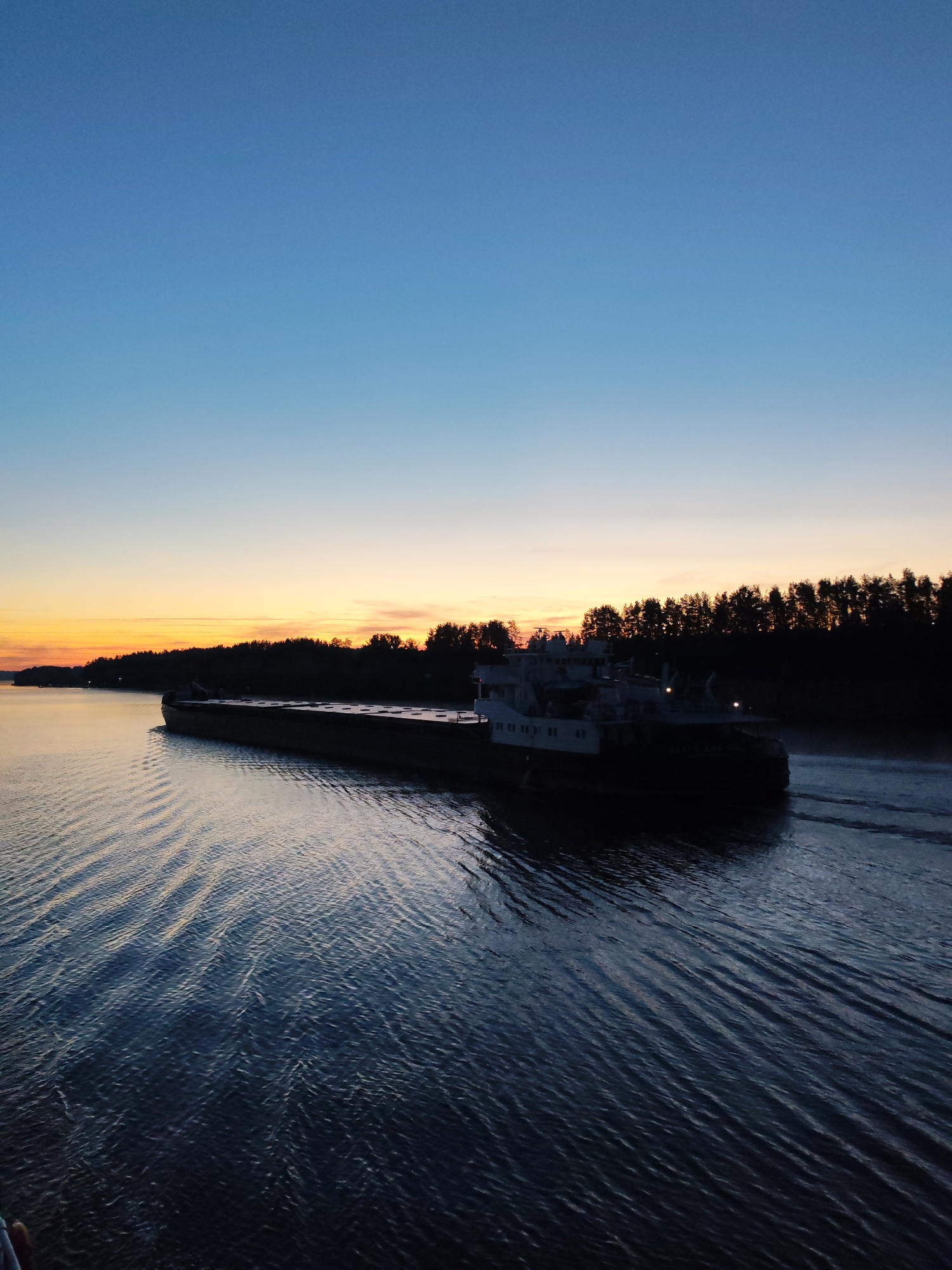 Twilight gradient captured over calm water at unknown location