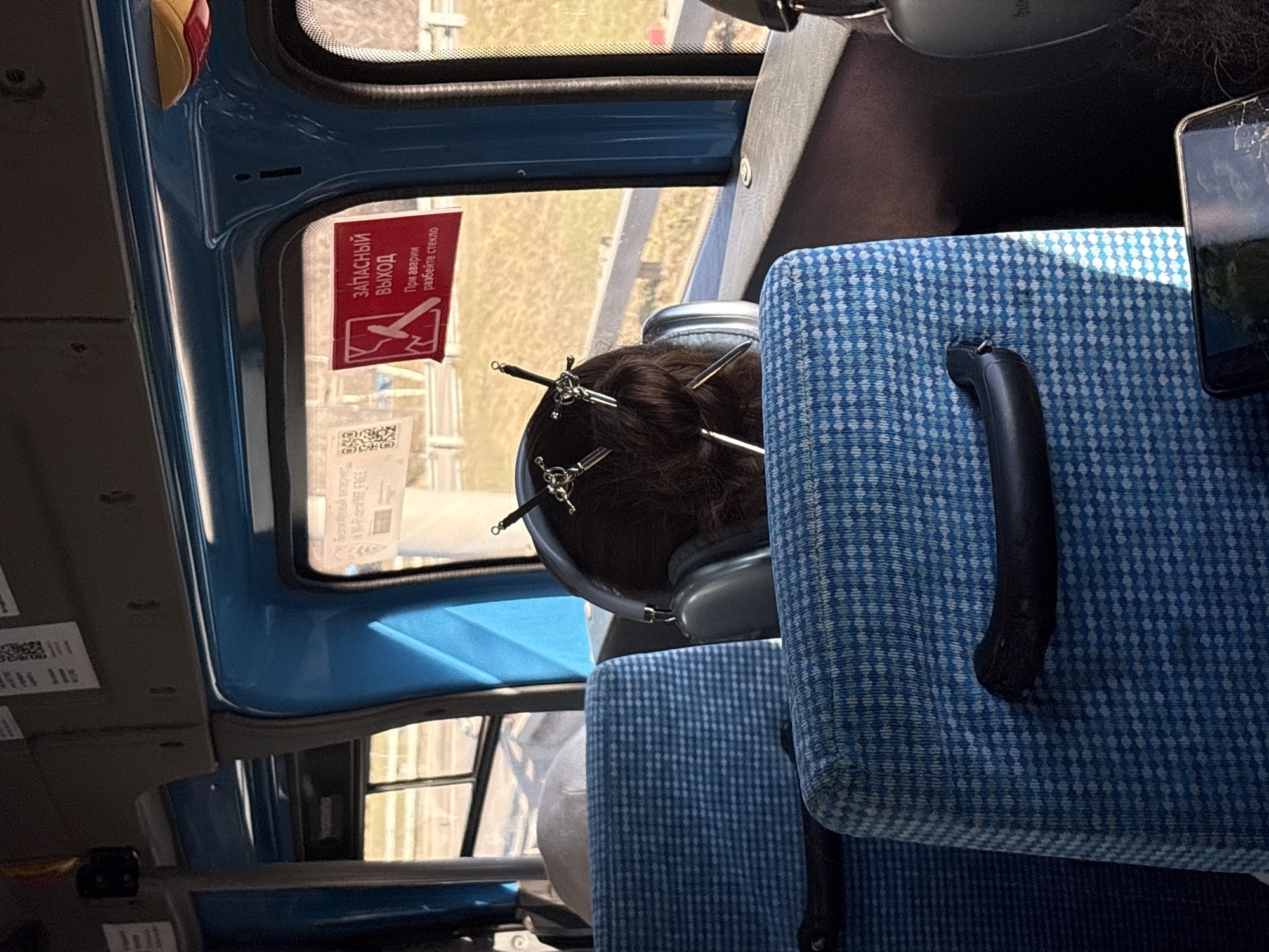Morning commuter spotted on Moscow public transit wearing headphones