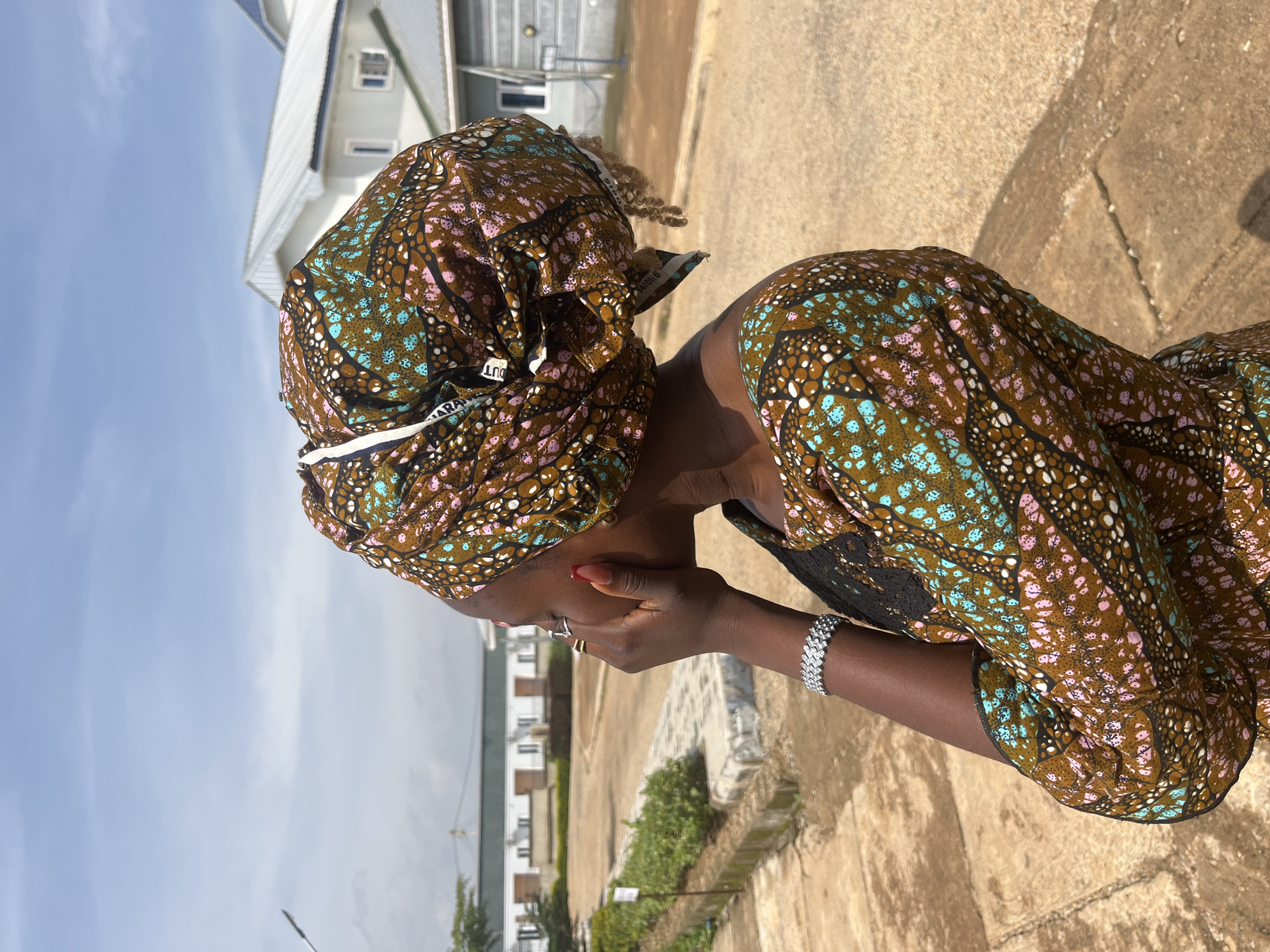 Portrait and medical facility exterior, Barakin Mairaga, Nigeria