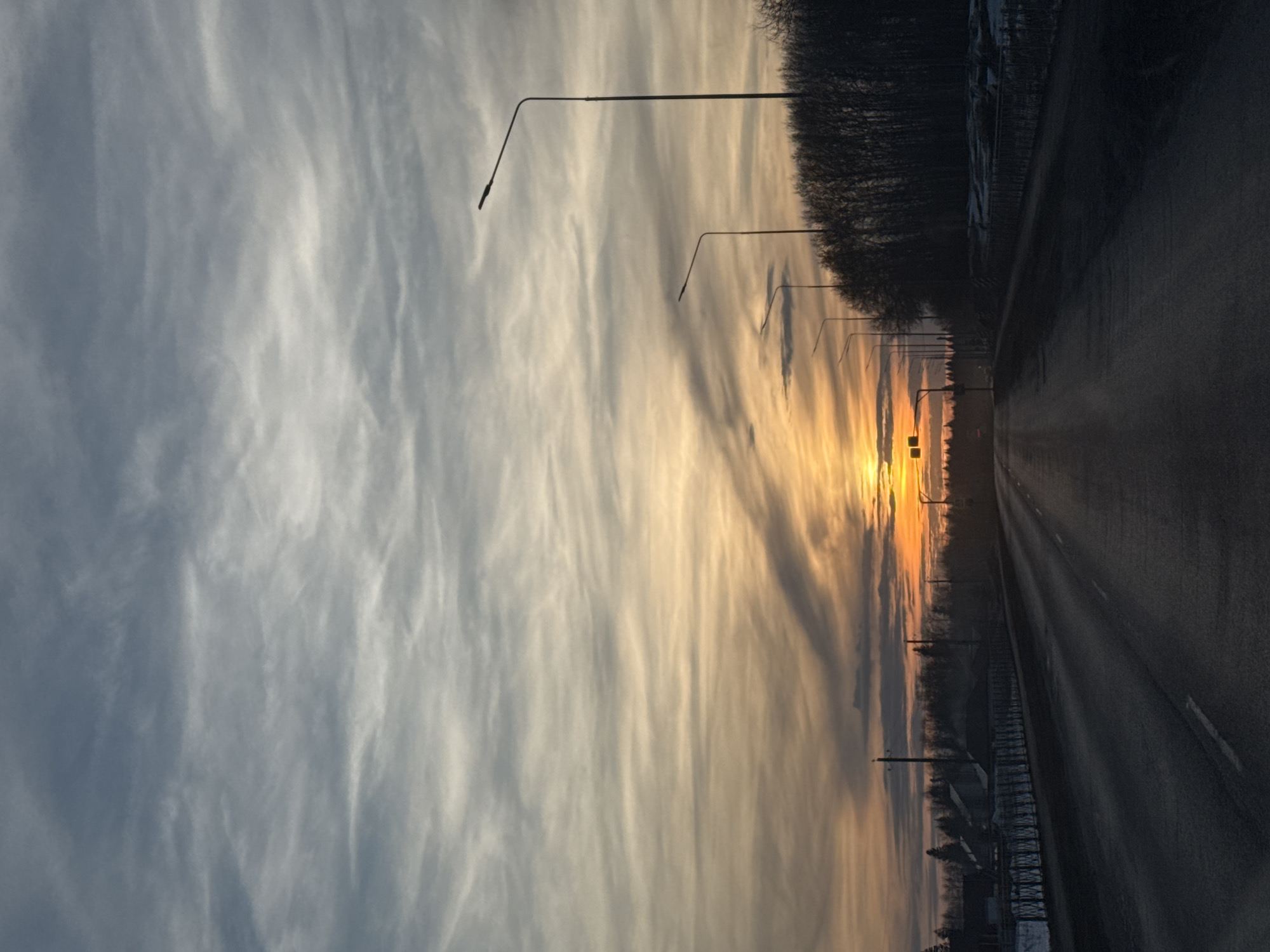 Sunset photograph captures empty road in Chernushka, Russia