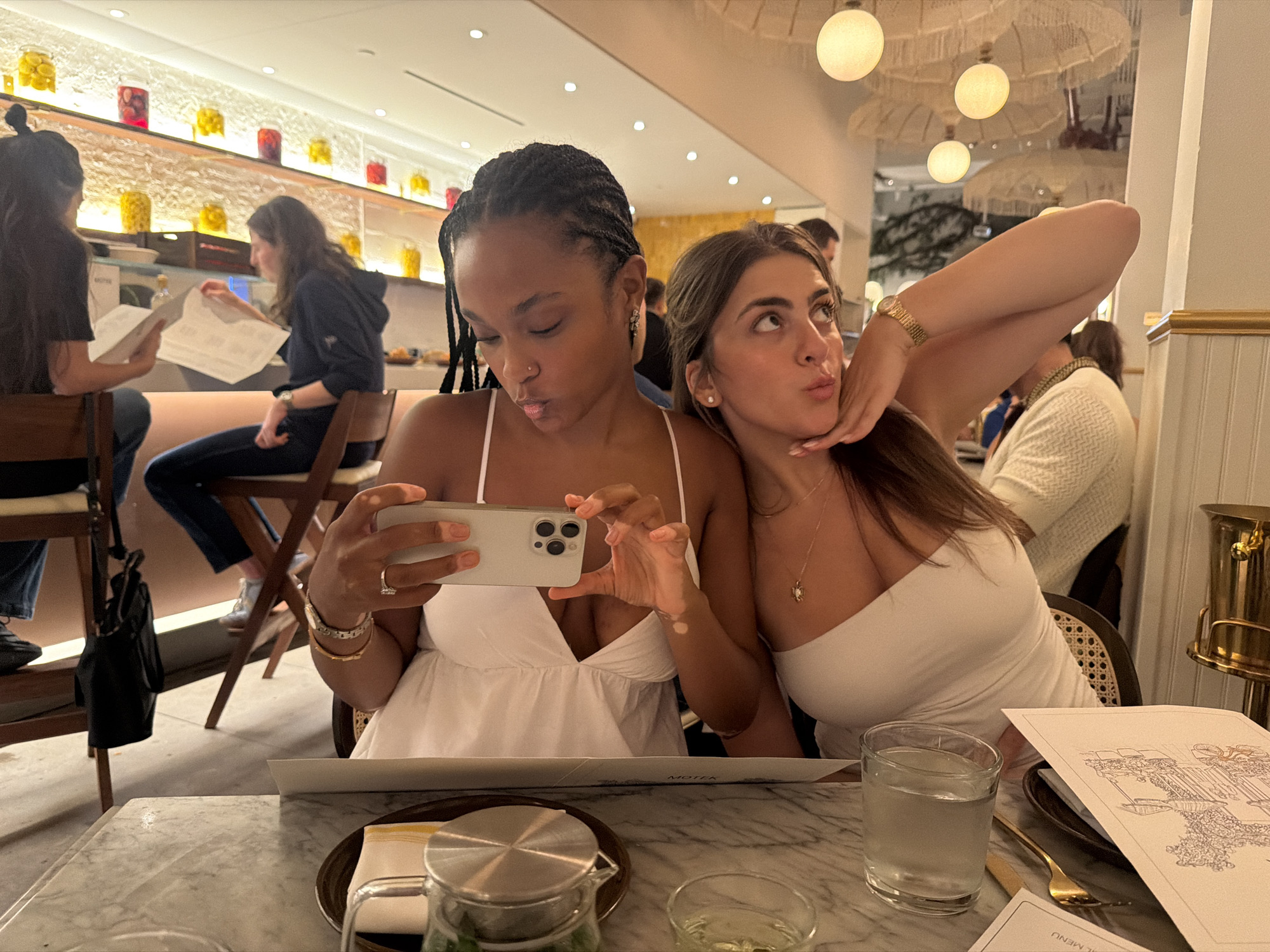 Selfie moment at an upscale NYC restaurant table