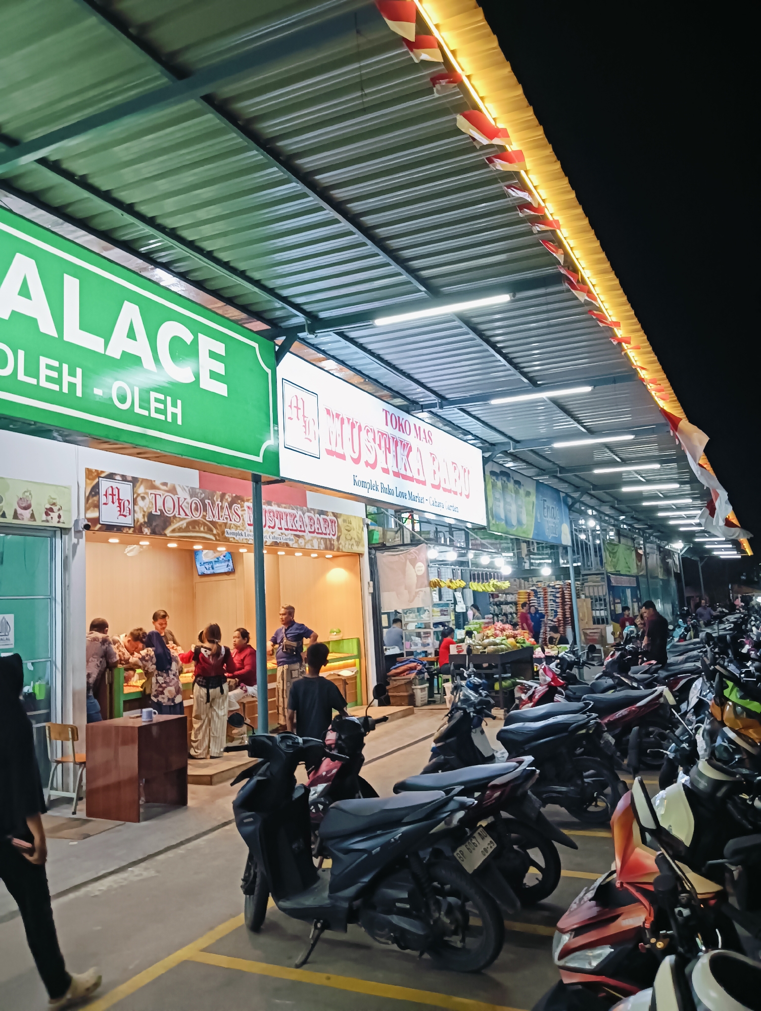 Inside and around Batam's Love Market commercial strip at night