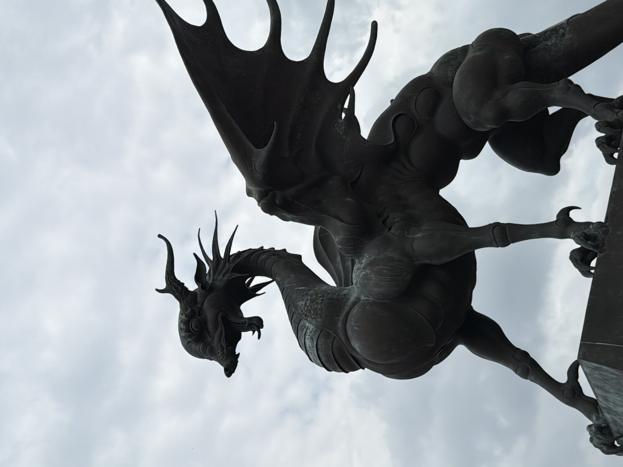 Kazan's dragon statue draws visitors on a summer afternoon