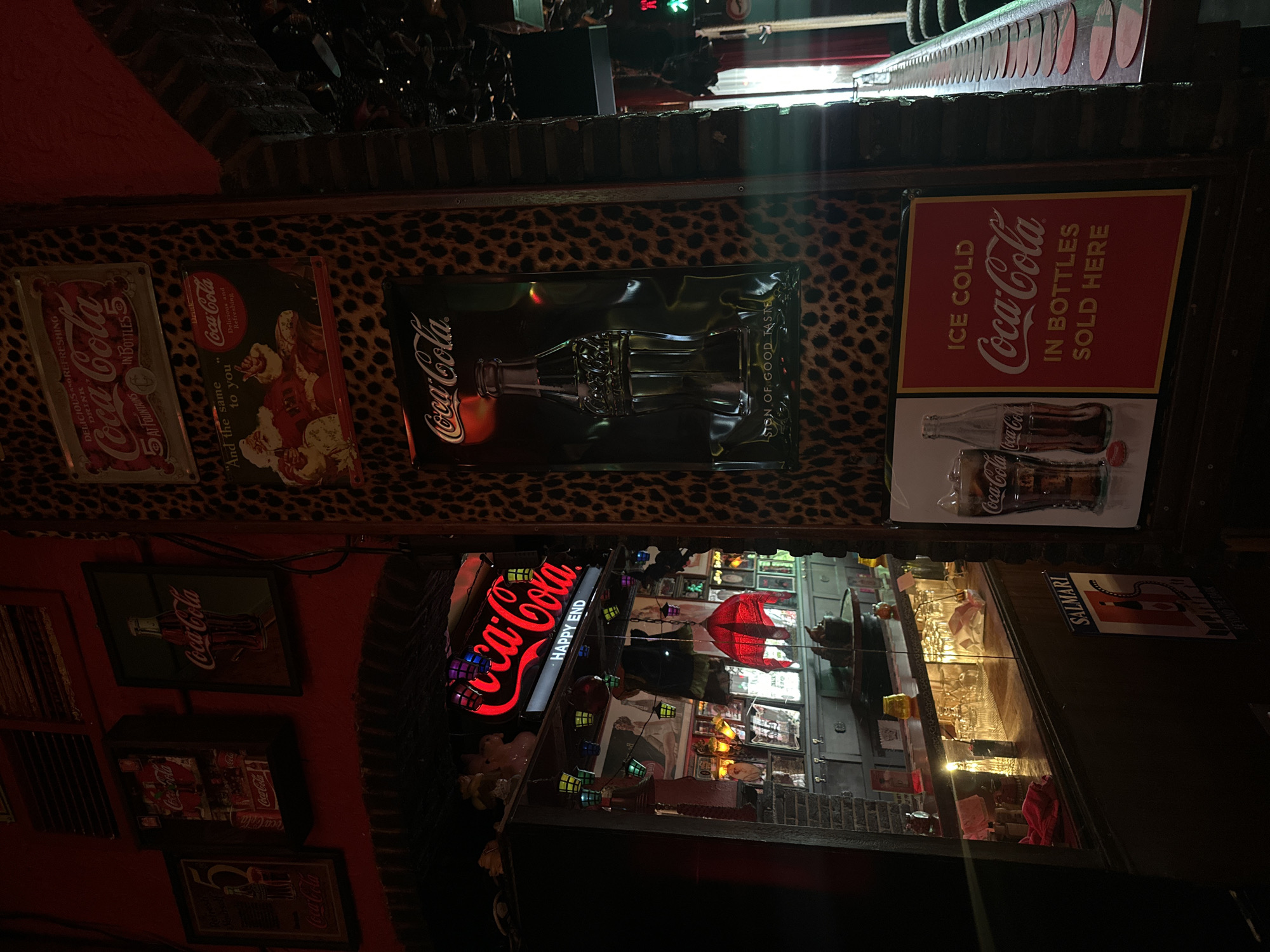 Inside a cluttered, kitschy themed bar in The Hague