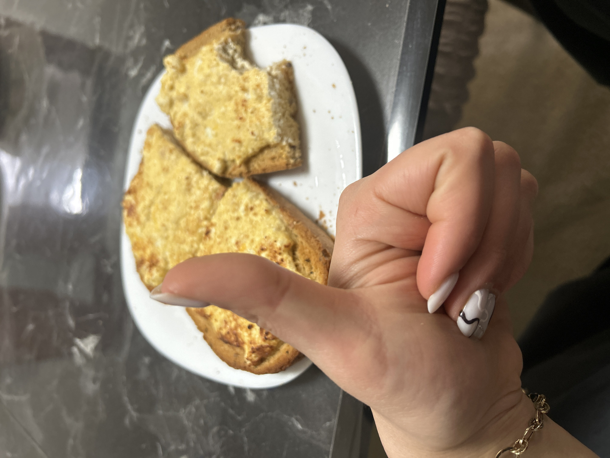 Woman documents breakfast and cat in Burgas morning routine