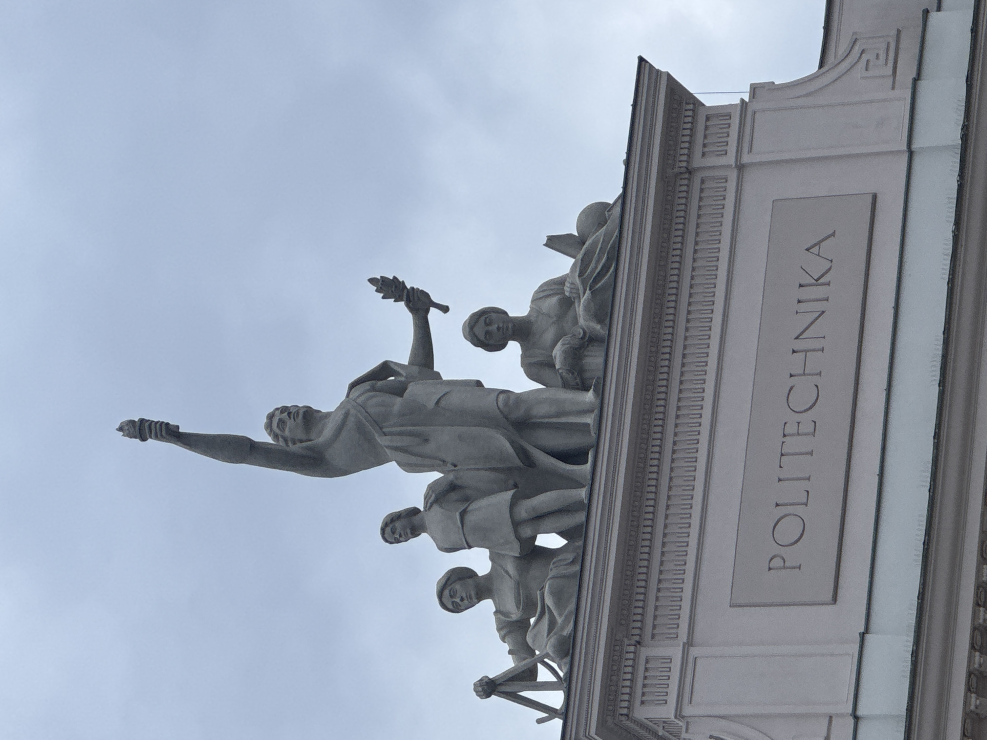 Warsaw University of Technology facade and entrance sculpture, up close