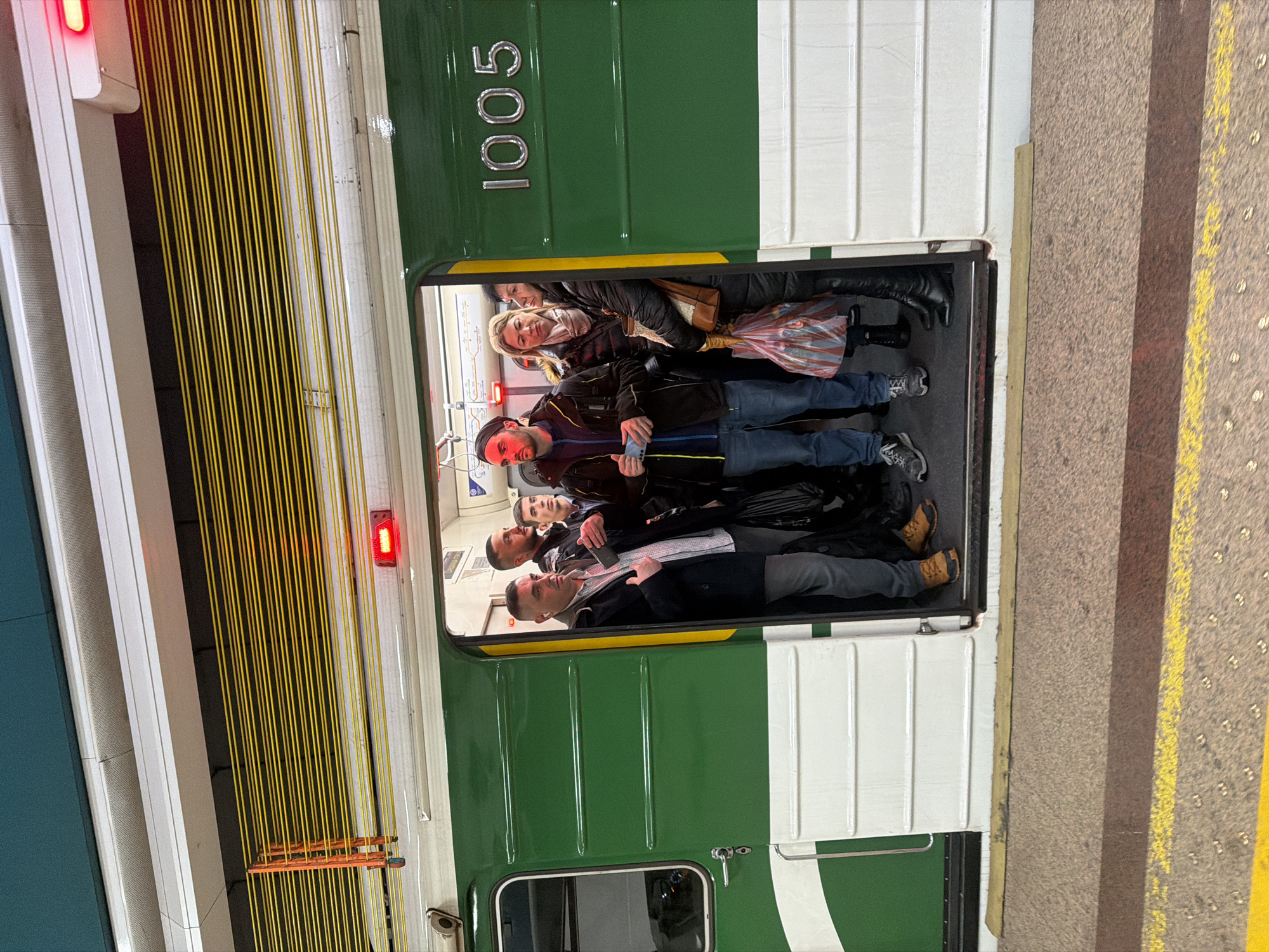 Packed subway car 1005 carries crowded passengers in Sofia