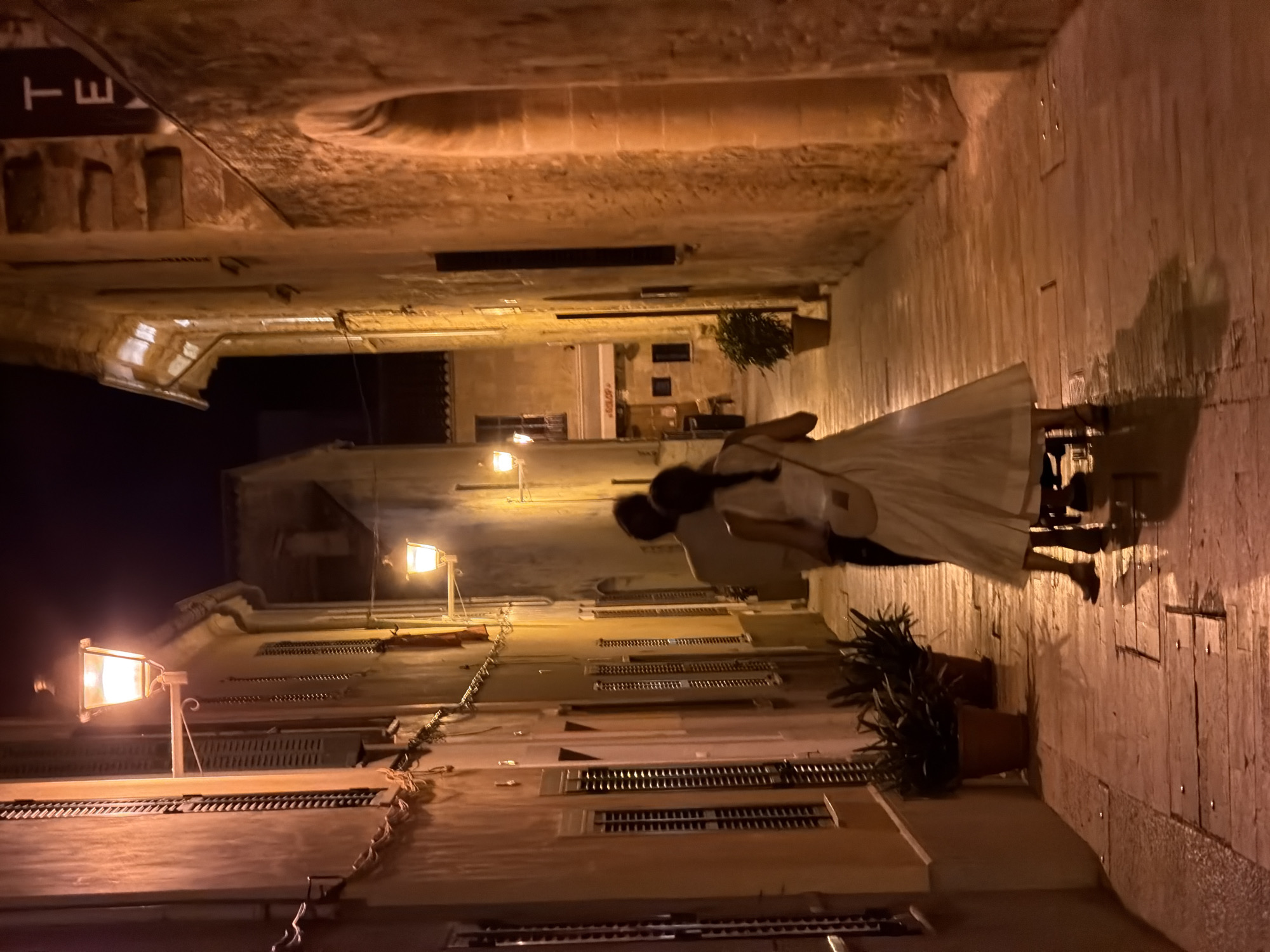 Evening stroll documented through historic Alcúdia streets and landmarks
