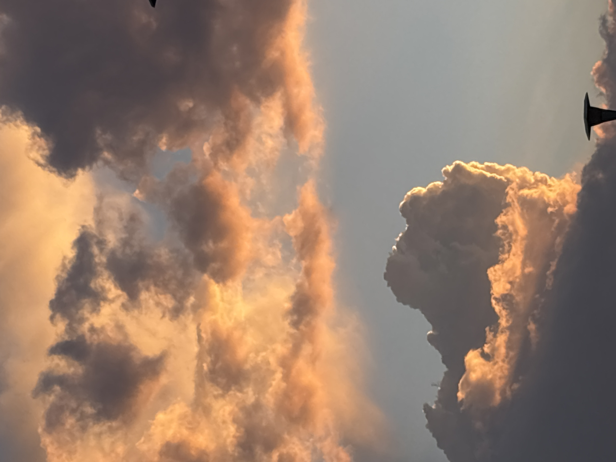 Metallic object spotted in cloudy sky over Mexico