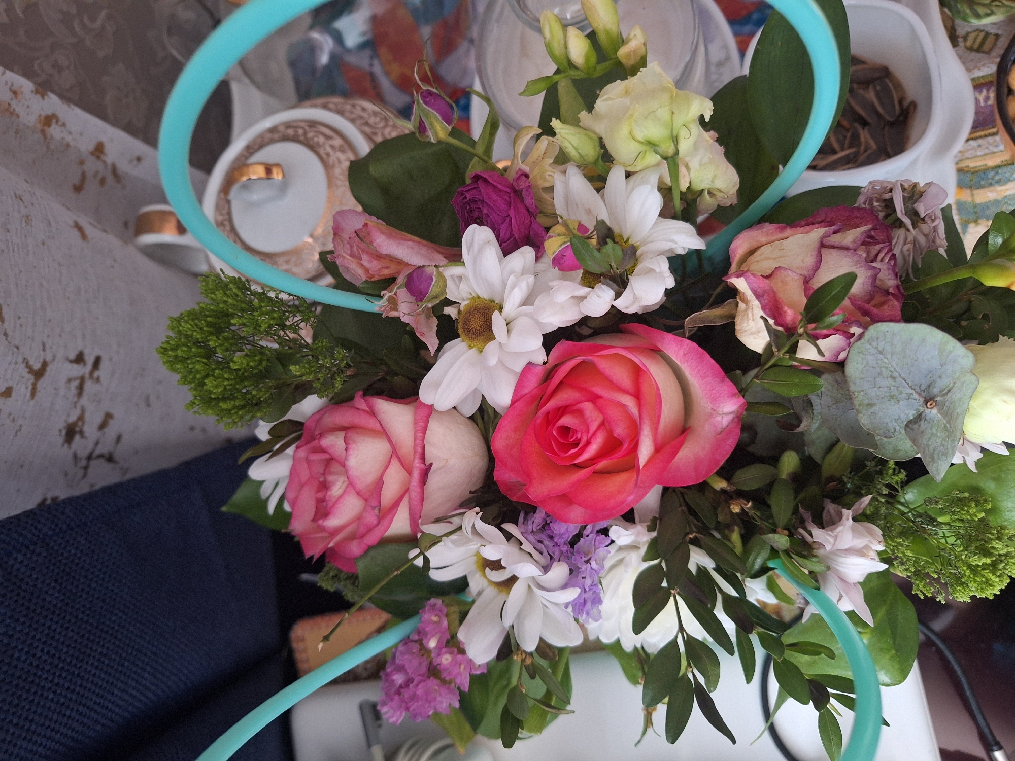 Floral arrangement with mixed flowers observed on Moscow table