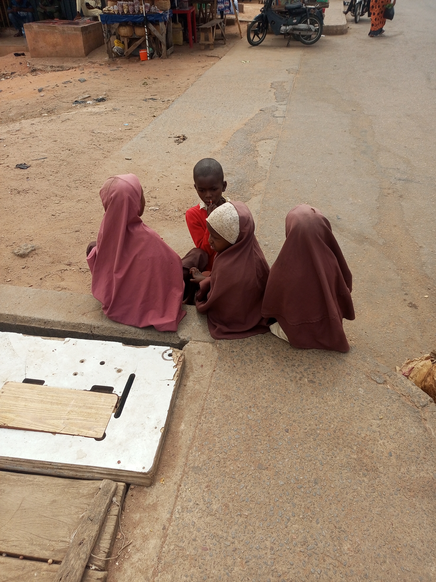 Daily life documented in Nigerian markets and streets