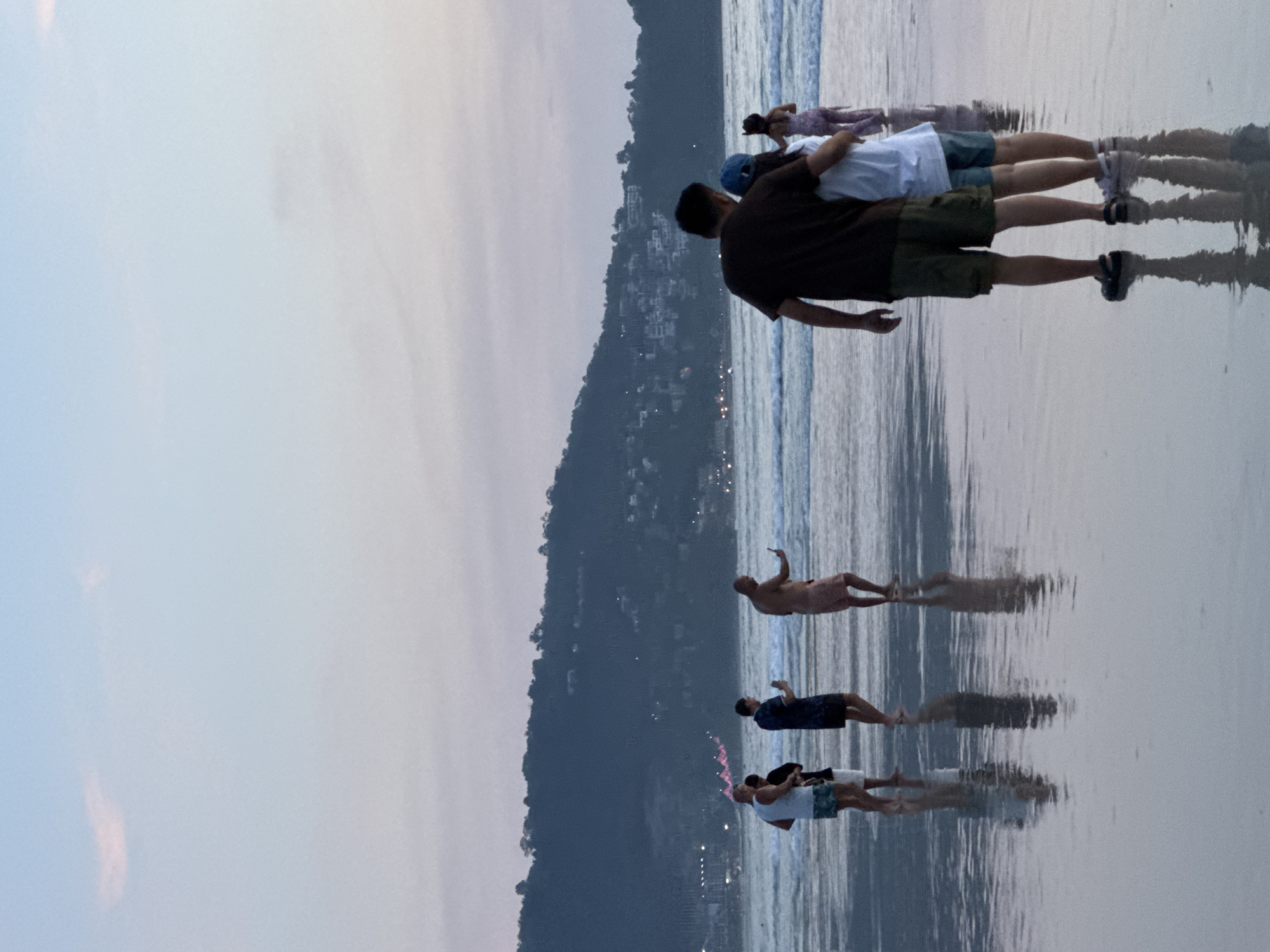 Patong Beach at dusk, shoreline scenes during golden hour