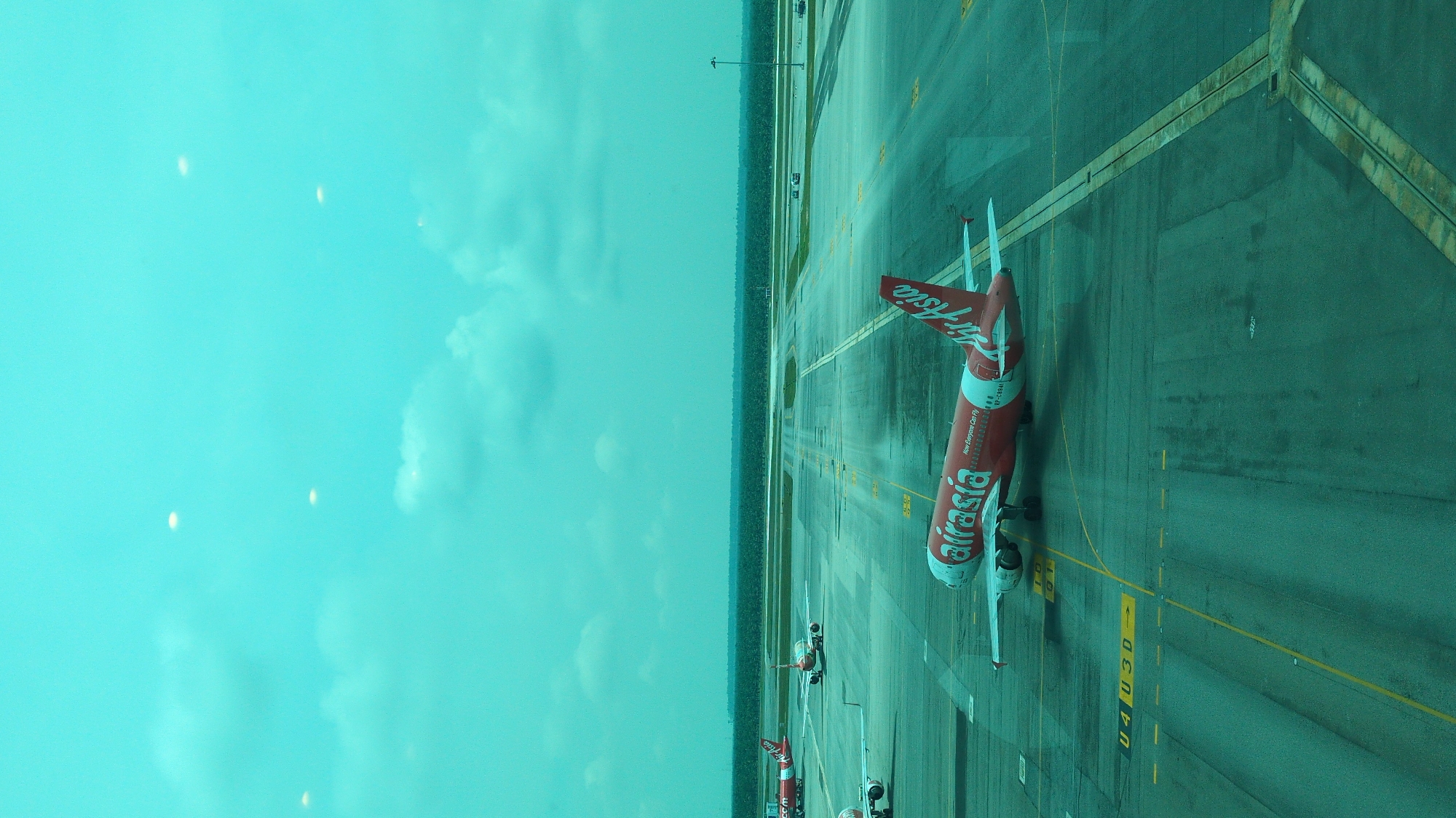 Early morning AirAsia operations documented at Sepang airport