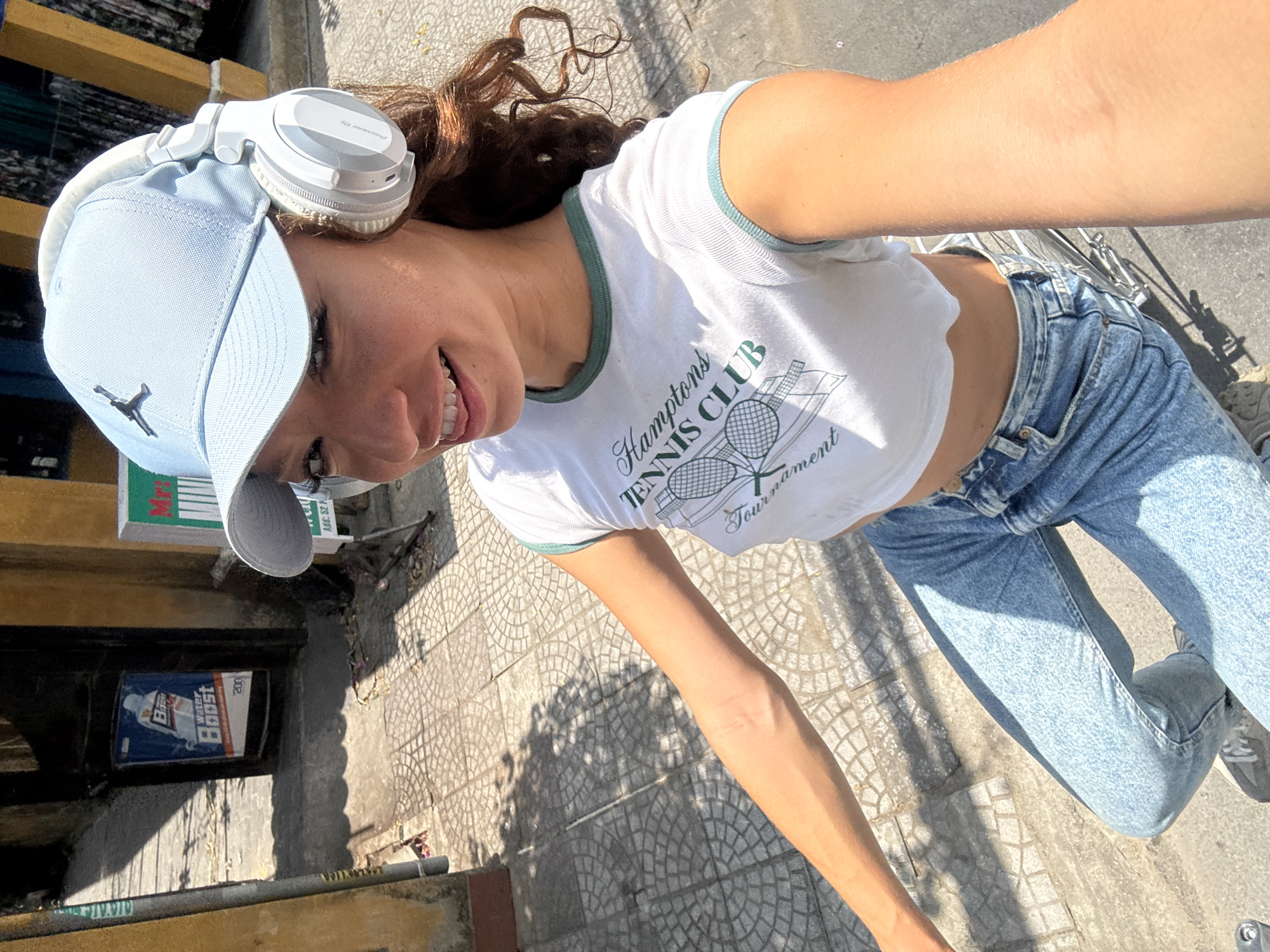 Woman takes selfies in early morning Hội An photo session