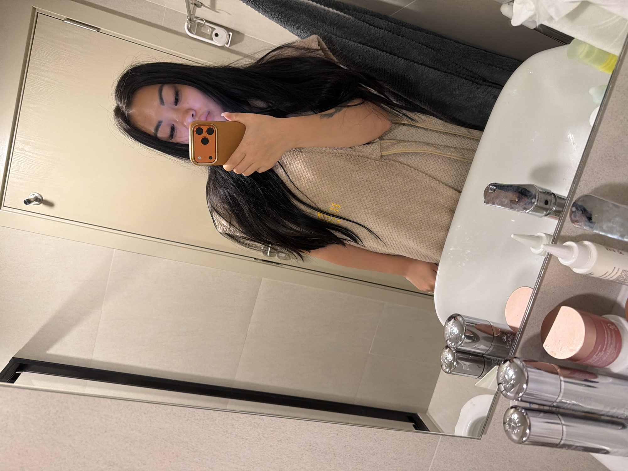 Woman takes bathroom selfies in Kathu, Thailand
