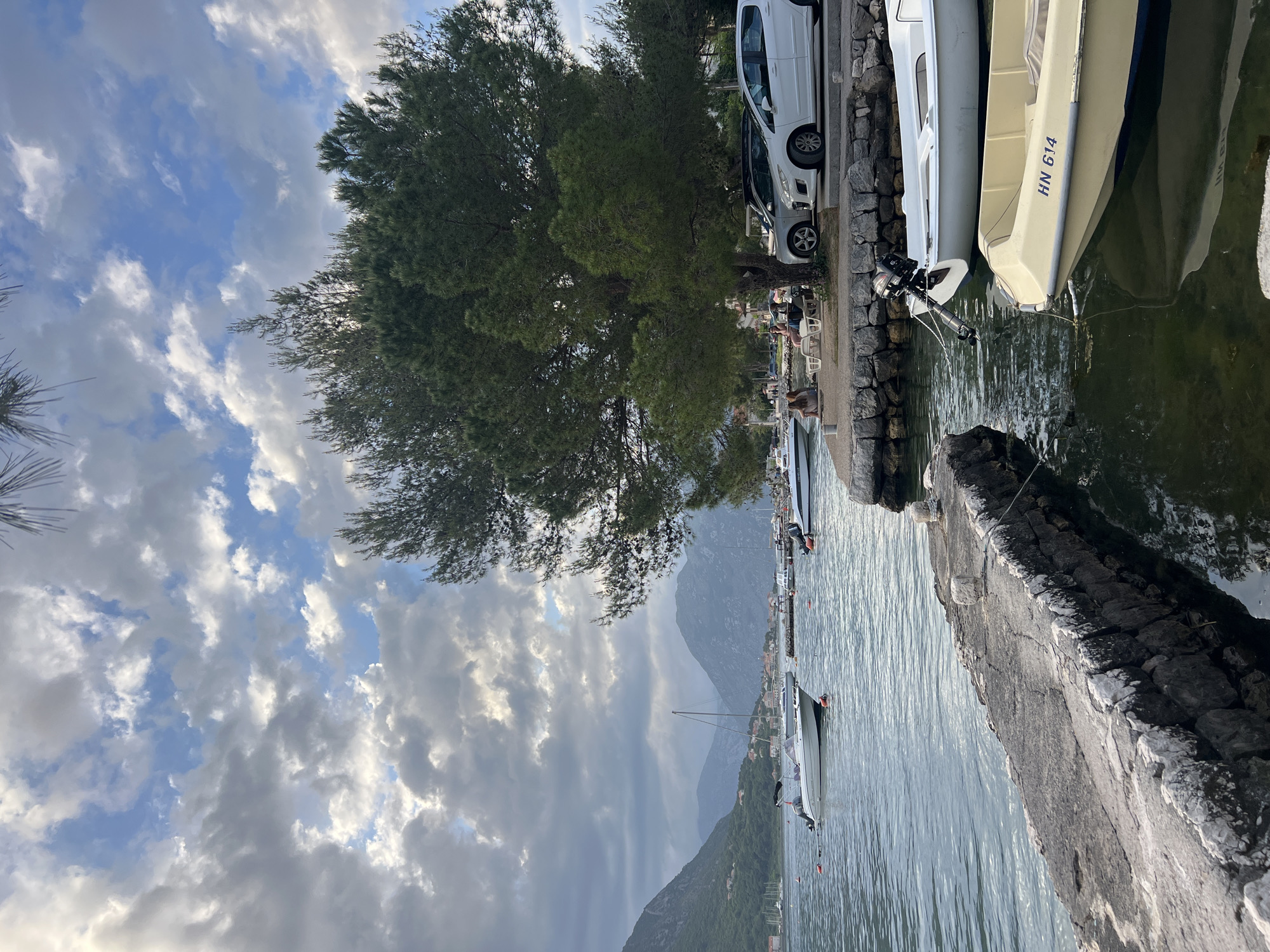 Tourist captures scenic waterfront moments in Dobrota, Montenegro