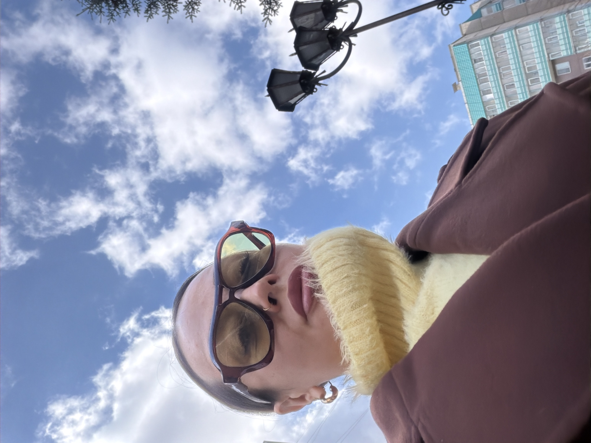 Person photographed looking skyward in Krasnoyarsk morning