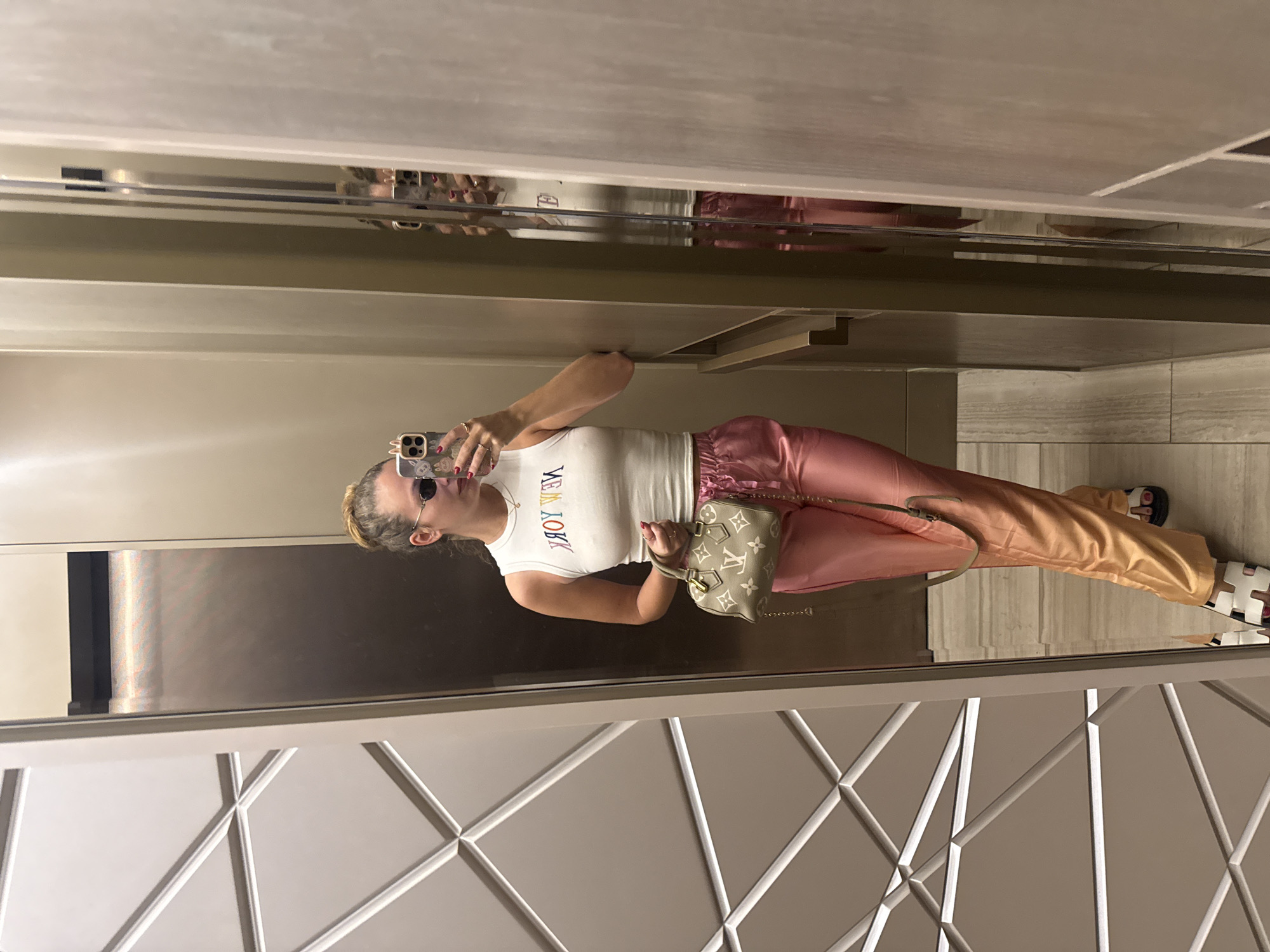 Woman Takes Mirror Selfie in Elevator, Khimki Russia