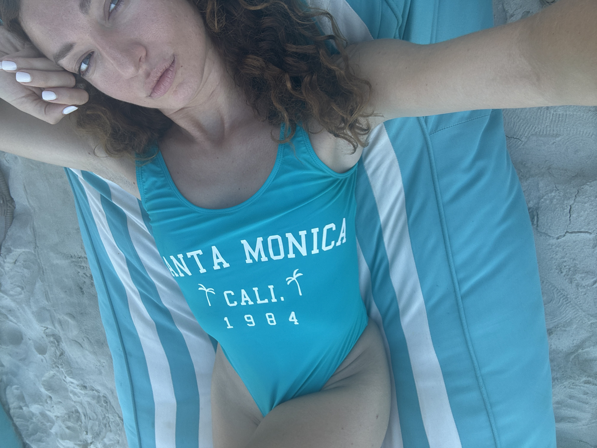 Lounging on a striped beach chair in Ko Samui