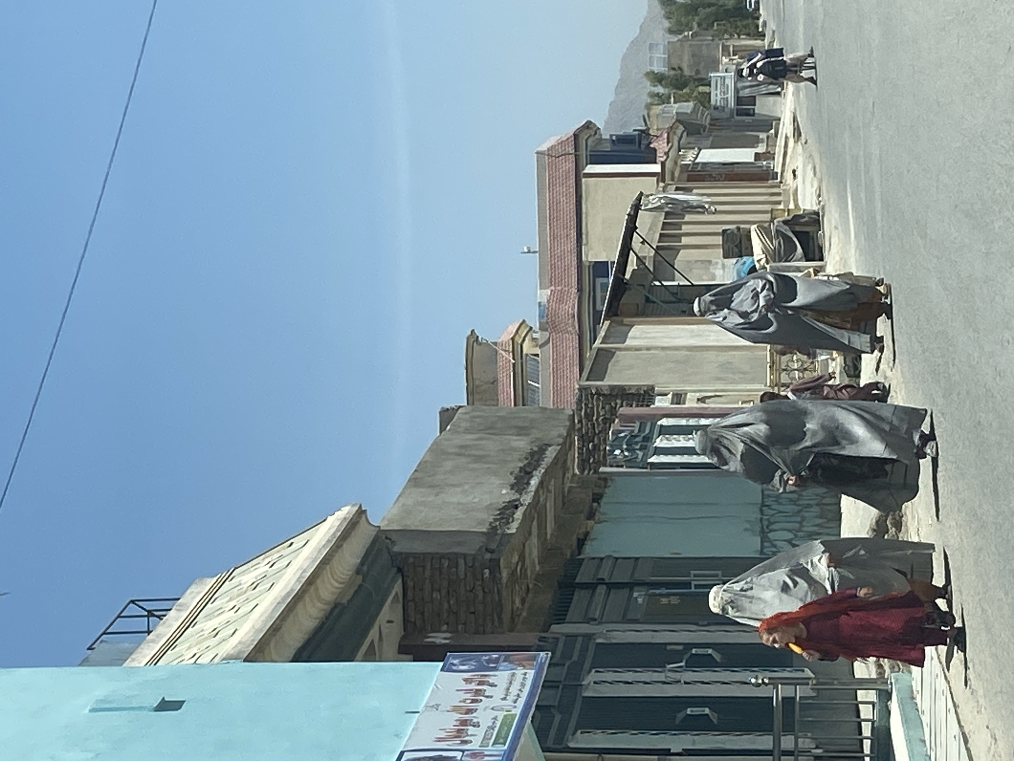 Everyday street life in Kandahar's commercial district