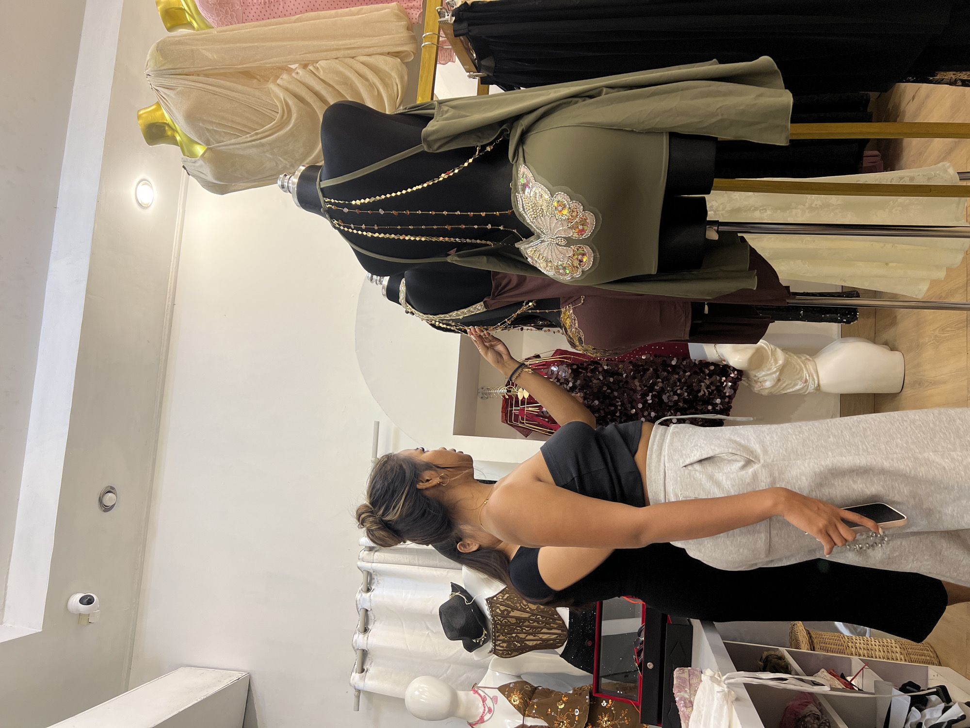 Woman shops for clothes at Kuta boutique